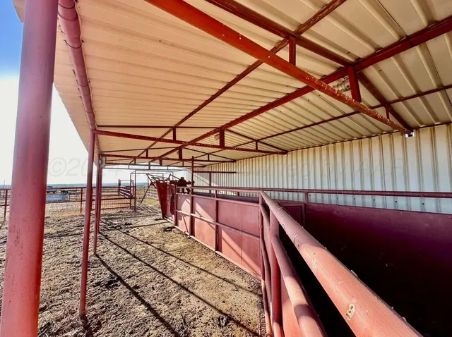 a view of swimming pool with outdoor seating