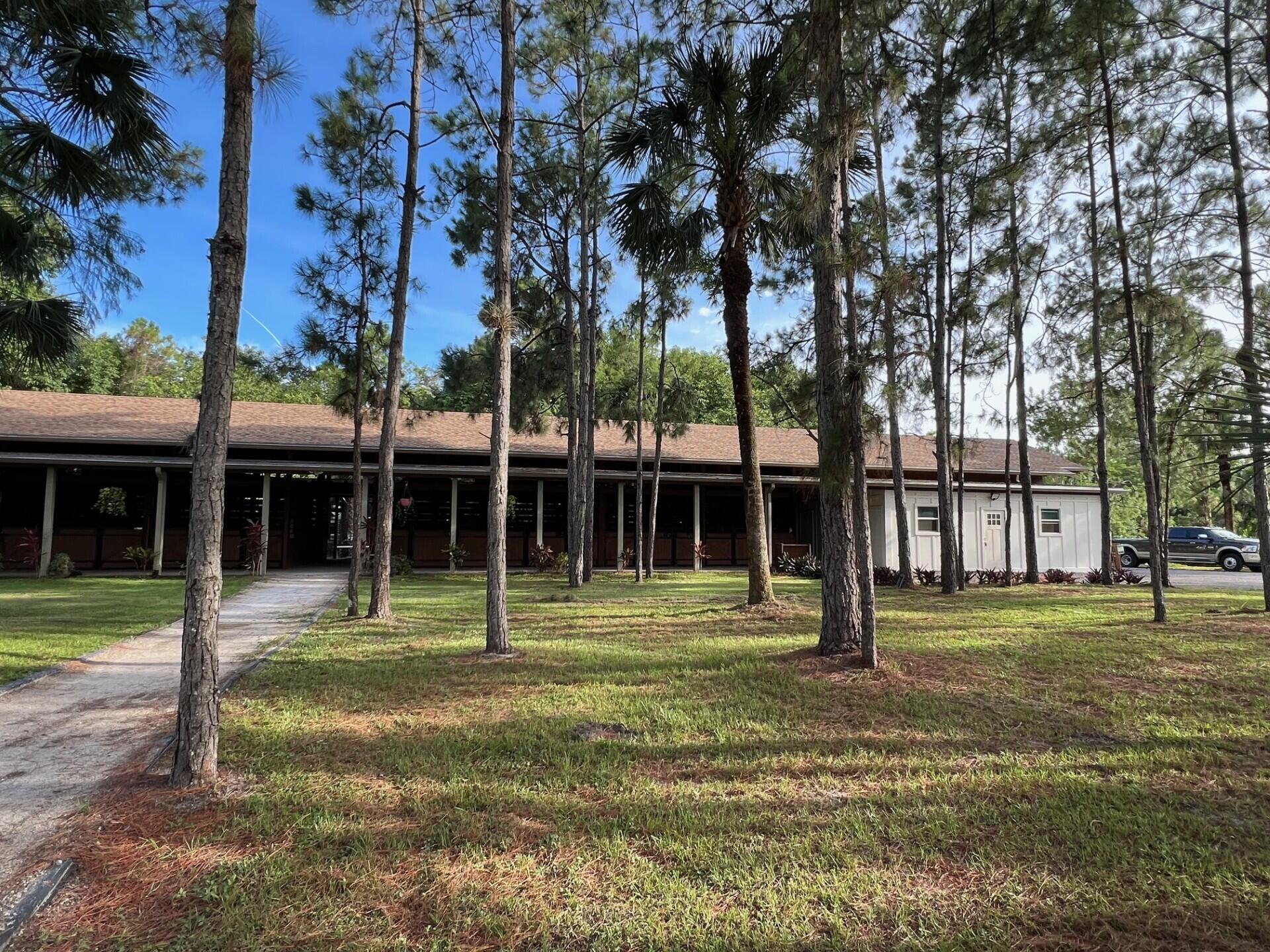 1711 Stallion Drive Loxahatchee, FL 33470 - Photo 11 of 23 a backyard of a house with entertaining space