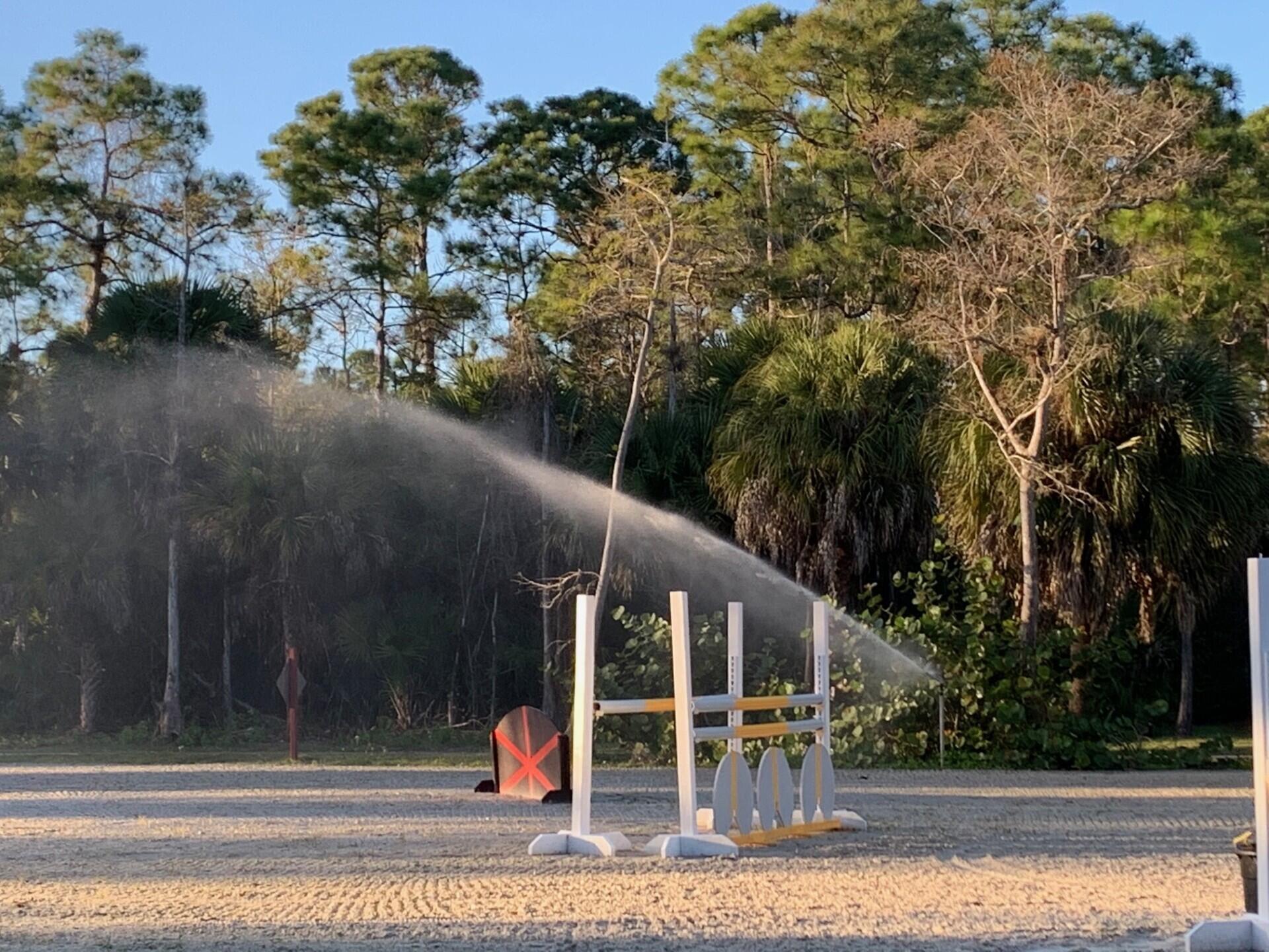 1711 Stallion Drive Loxahatchee, FL 33470 - Photo 18 of 23 a view of a house with a yard