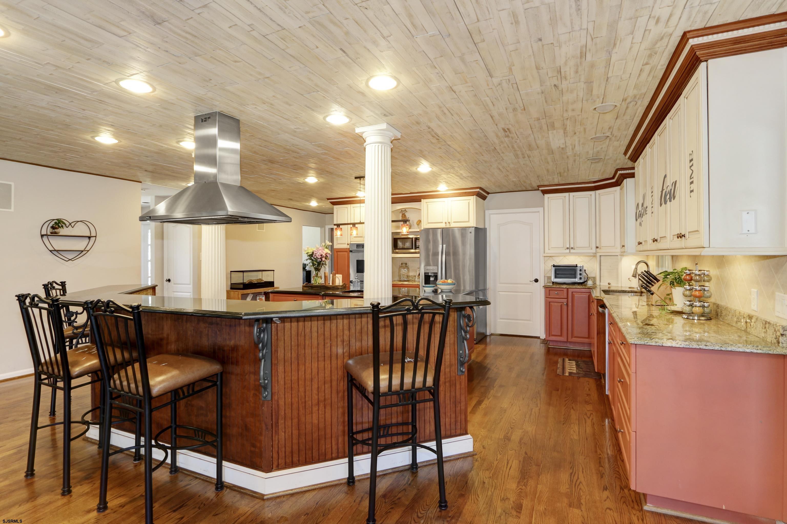1322 Shore Road Palermo, NJ 08230 - Photo 11 of 56 a view of a dining room with furniture and wooden floor