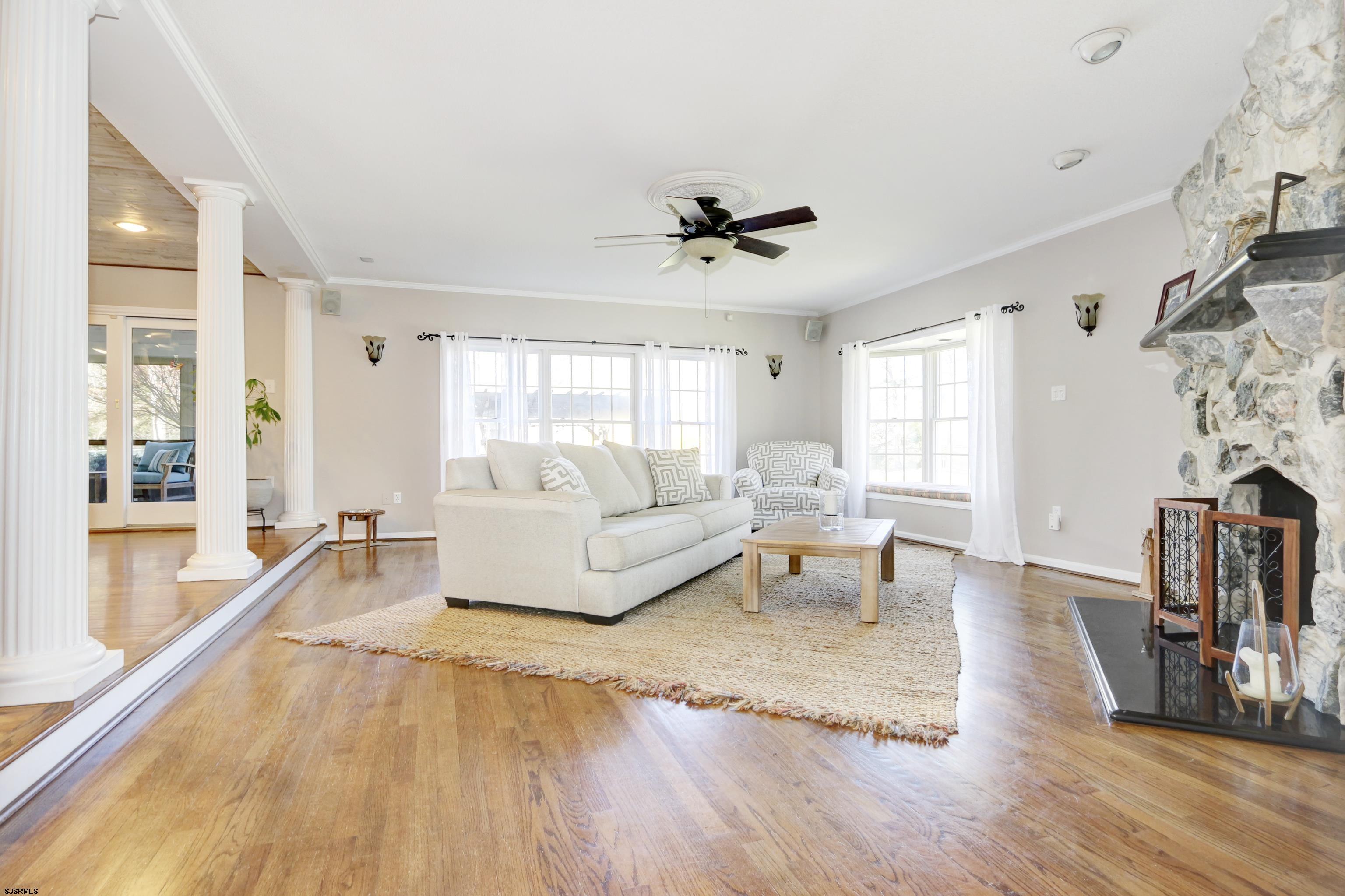 1322 Shore Road Palermo, NJ 08230 - Photo 13 of 56 a living room with furniture and a large window
