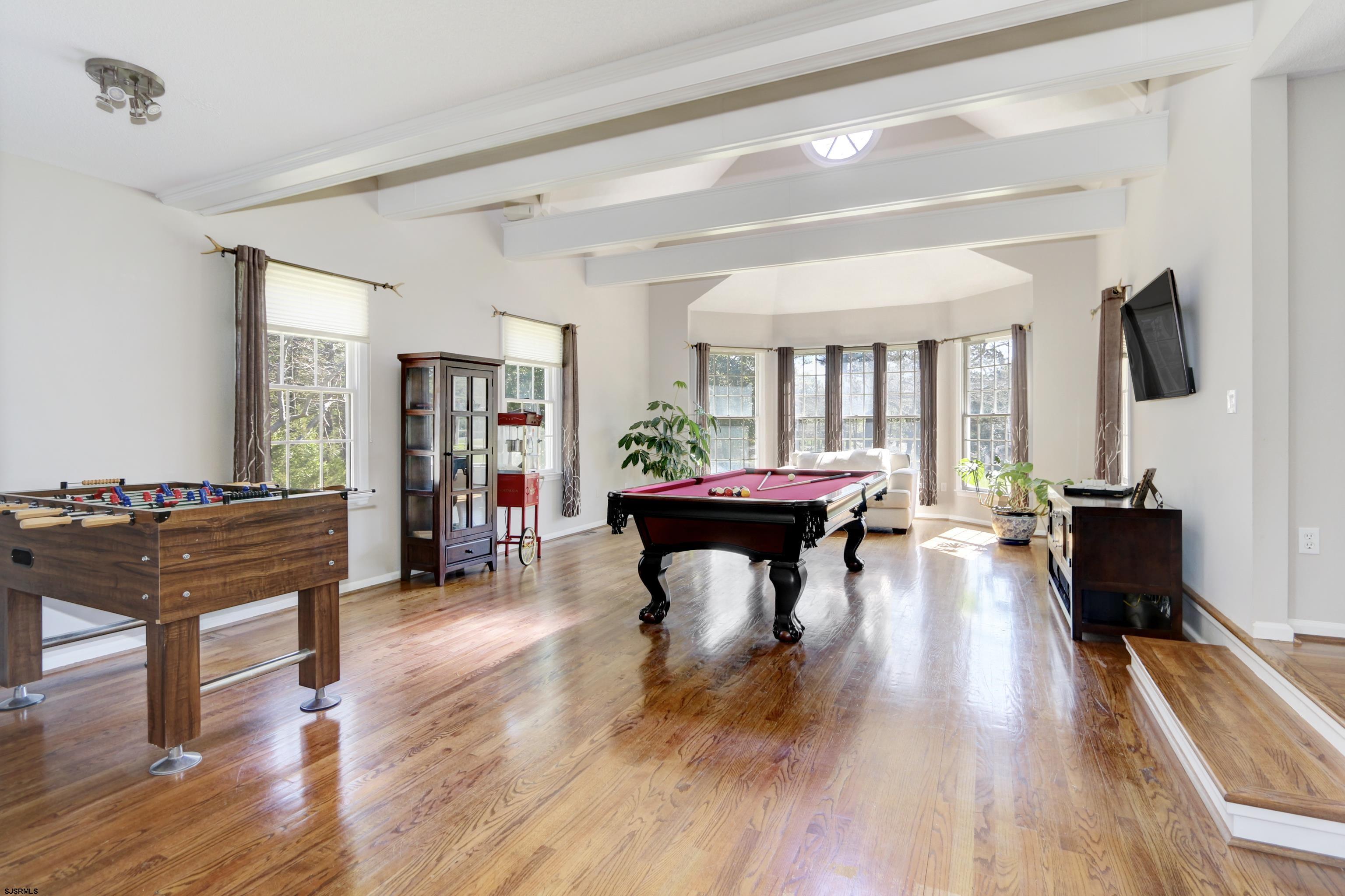 1322 Shore Road Palermo, NJ 08230 - Photo 14 of 56 a living room with furniture fireplace and a flat screen tv