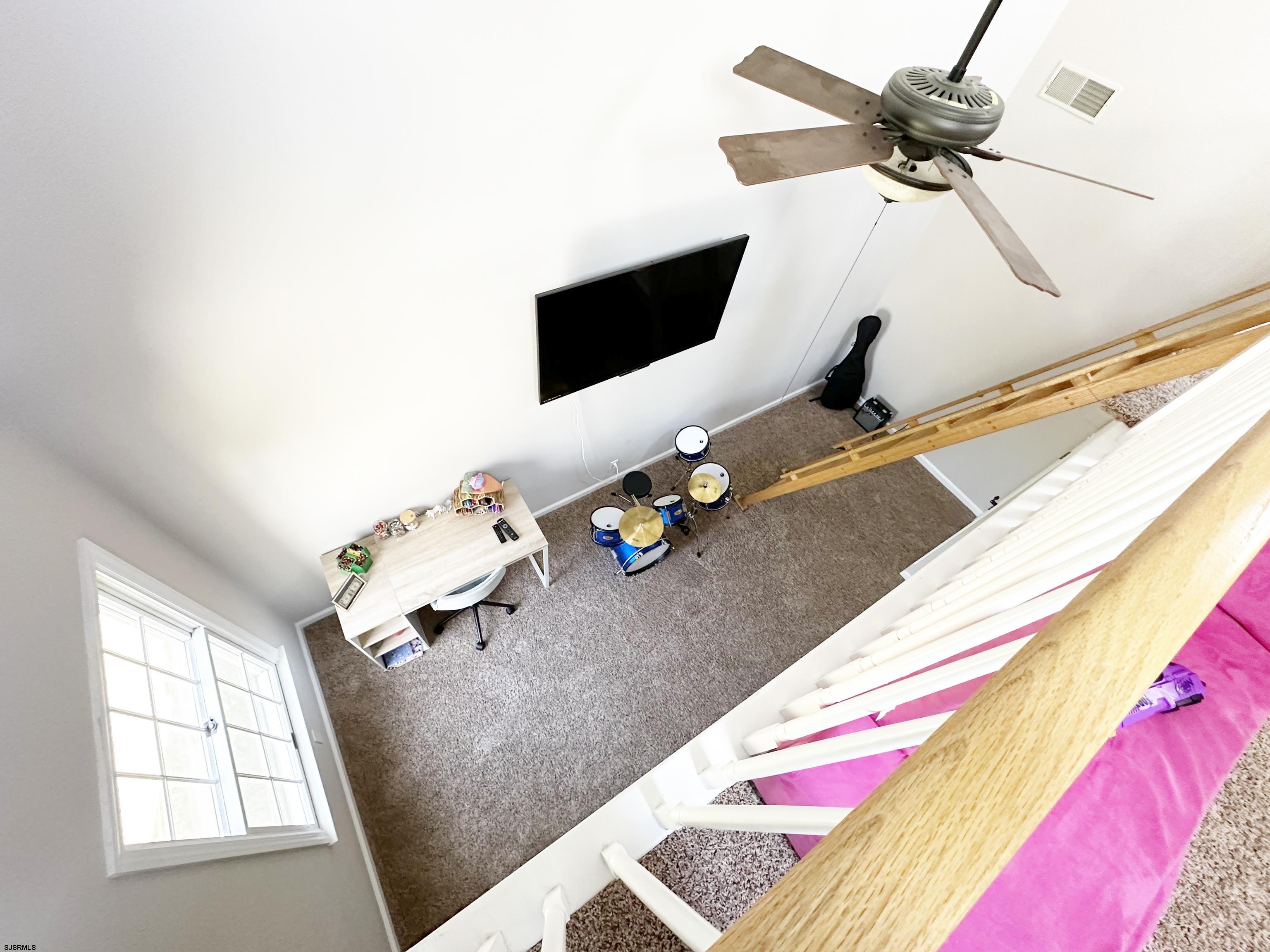 1322 Shore Road Palermo, NJ 08230 - Photo 20 of 56 a living room with furniture and flat screen tv