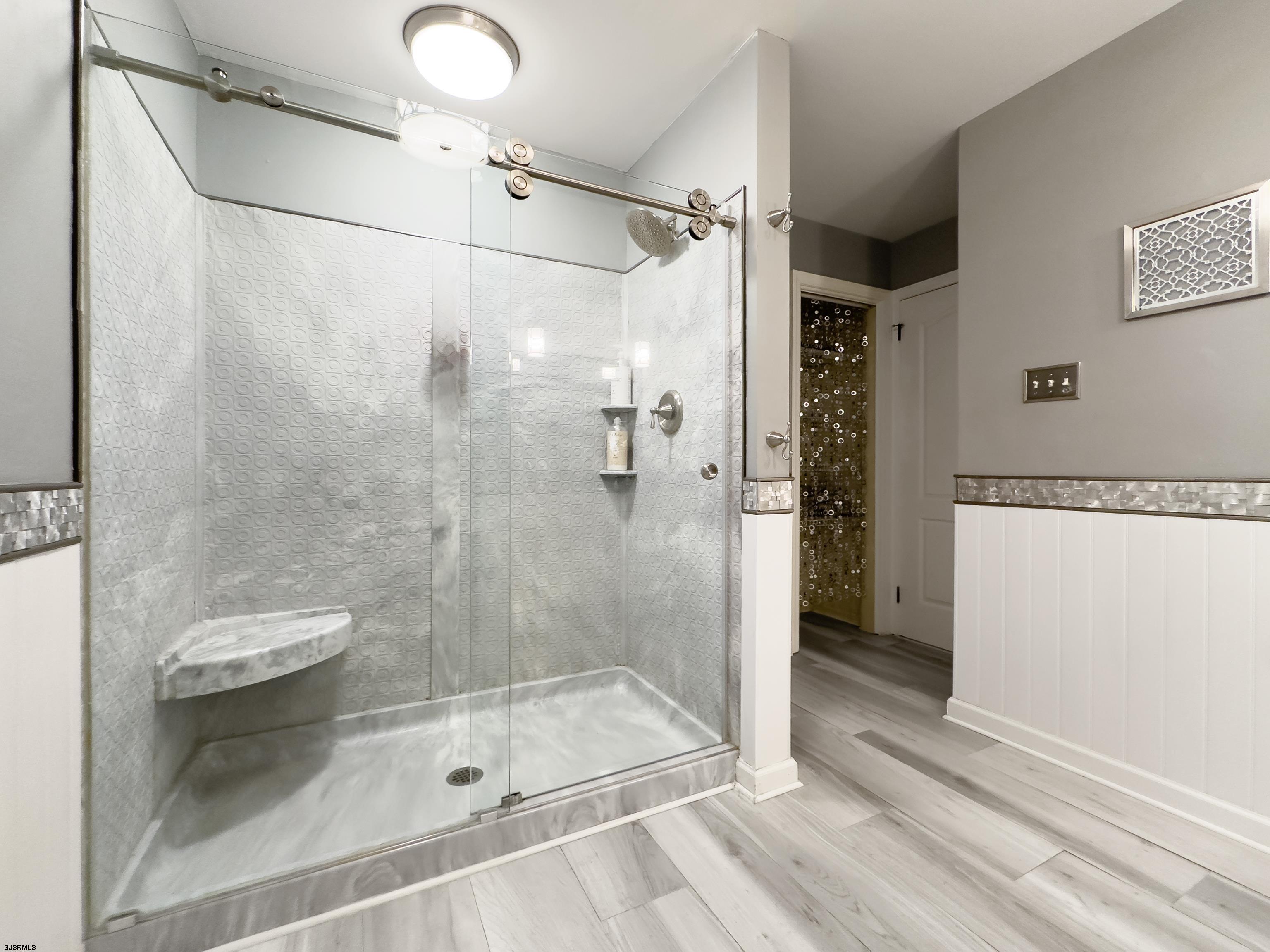 1322 Shore Road Palermo, NJ 08230 - Photo 25 of 56 a bathroom with a shower and a sink