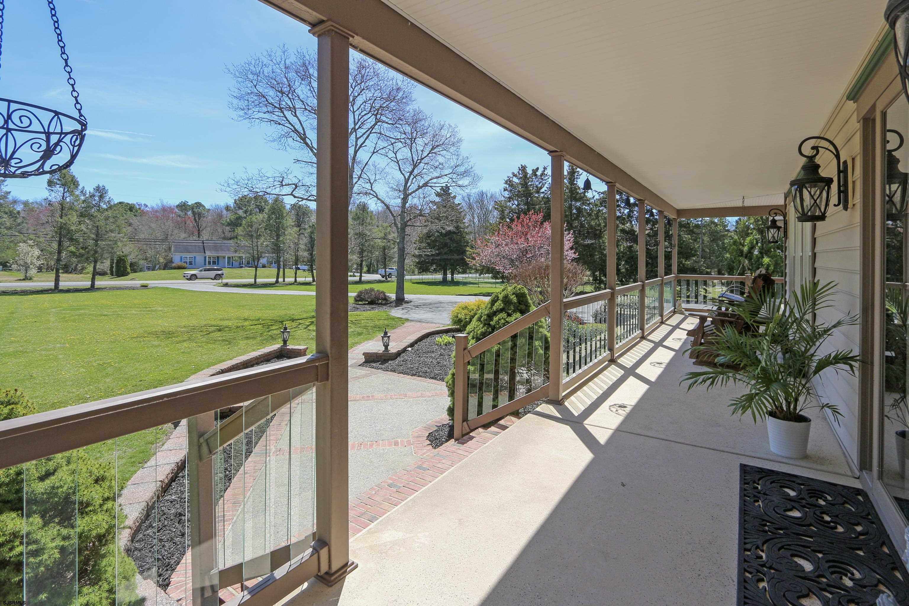 1322 Shore Road Palermo, NJ 08230 - Photo 3 of 56 a view of a porch with furniture and backyard