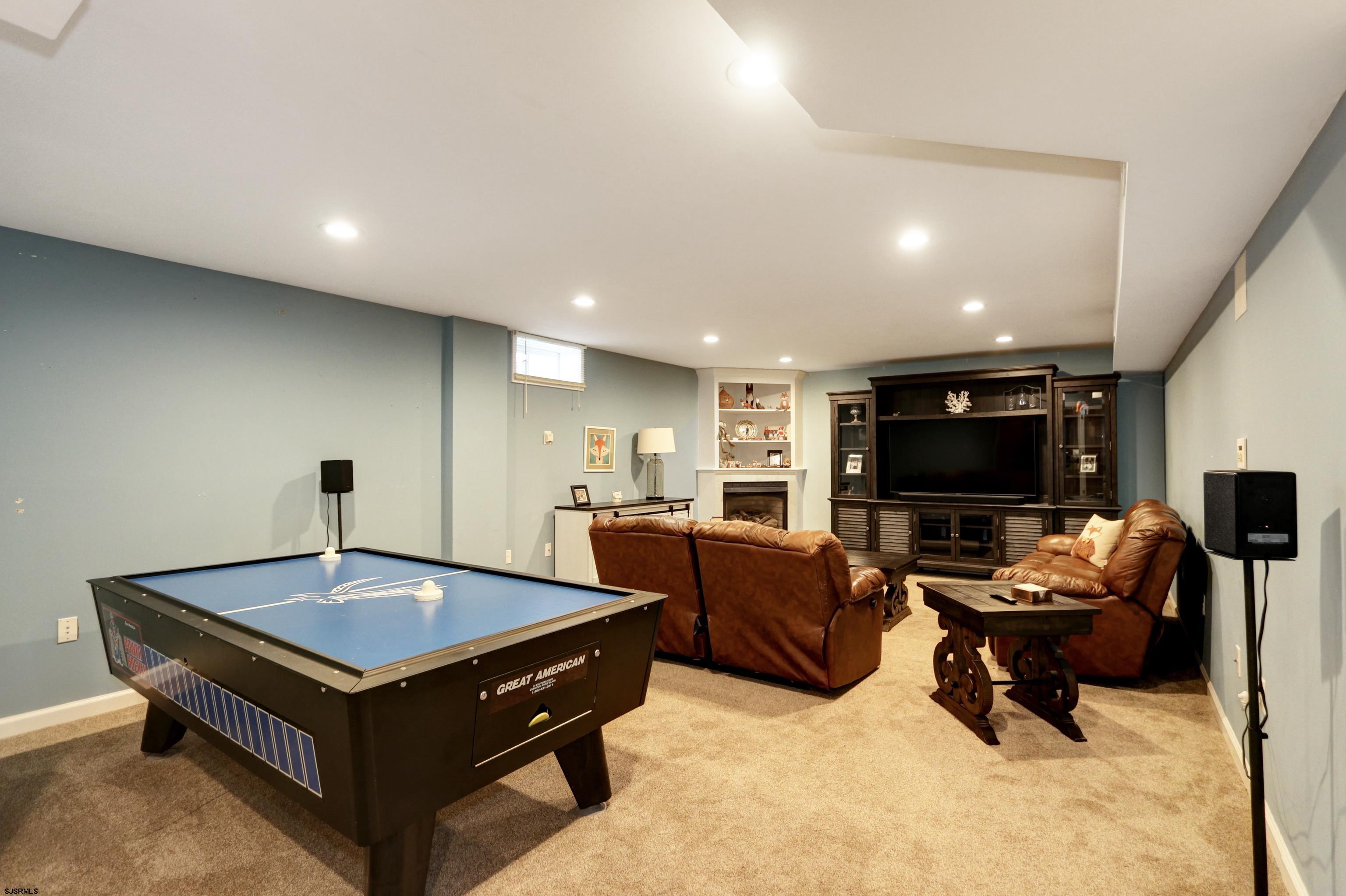 1322 Shore Road Palermo, NJ 08230 - Photo 34 of 56 a living room with furniture and a flat screen tv