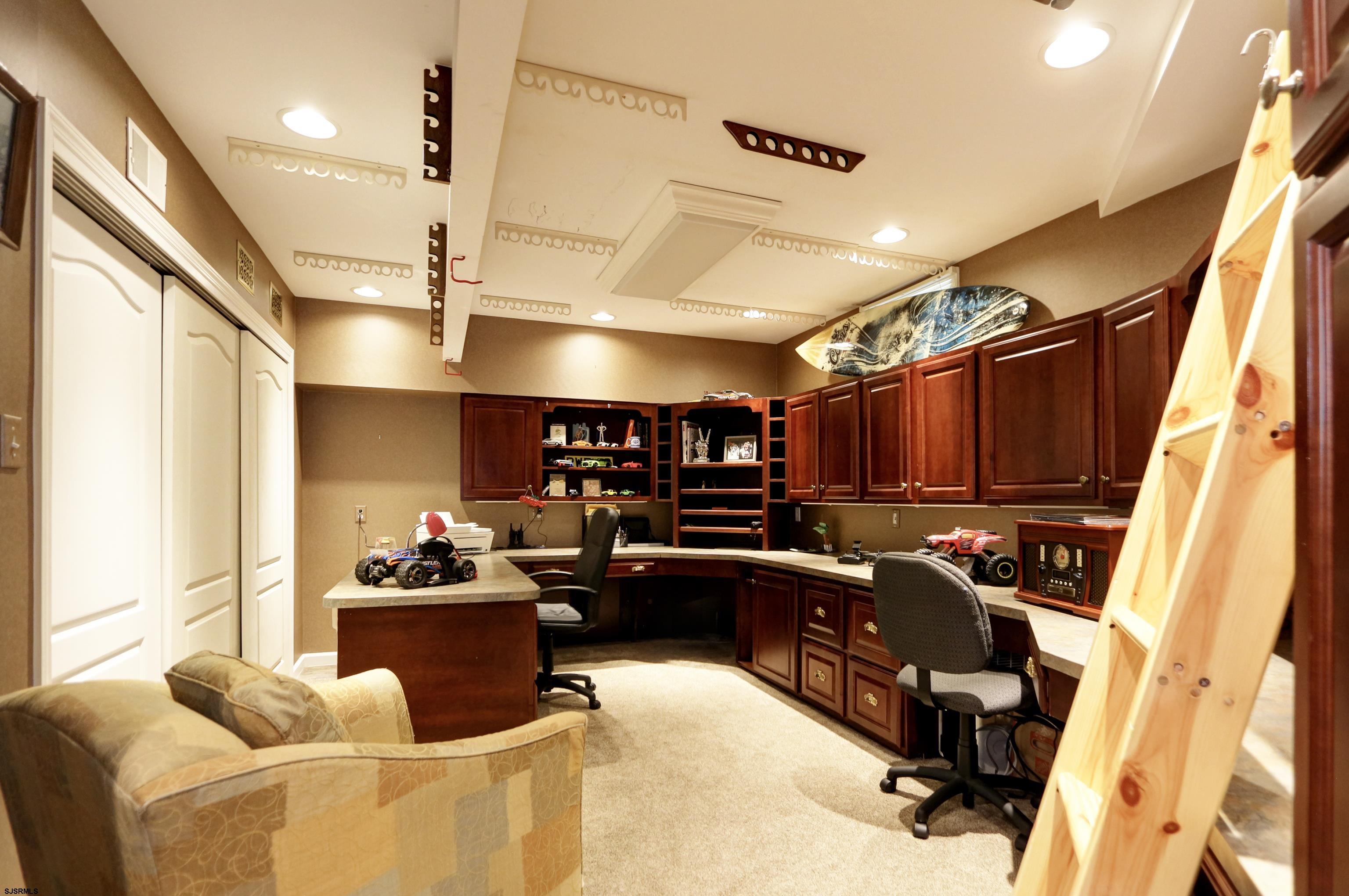 1322 Shore Road Palermo, NJ 08230 - Photo 36 of 56 a living room with lots of furniture and kitchen view