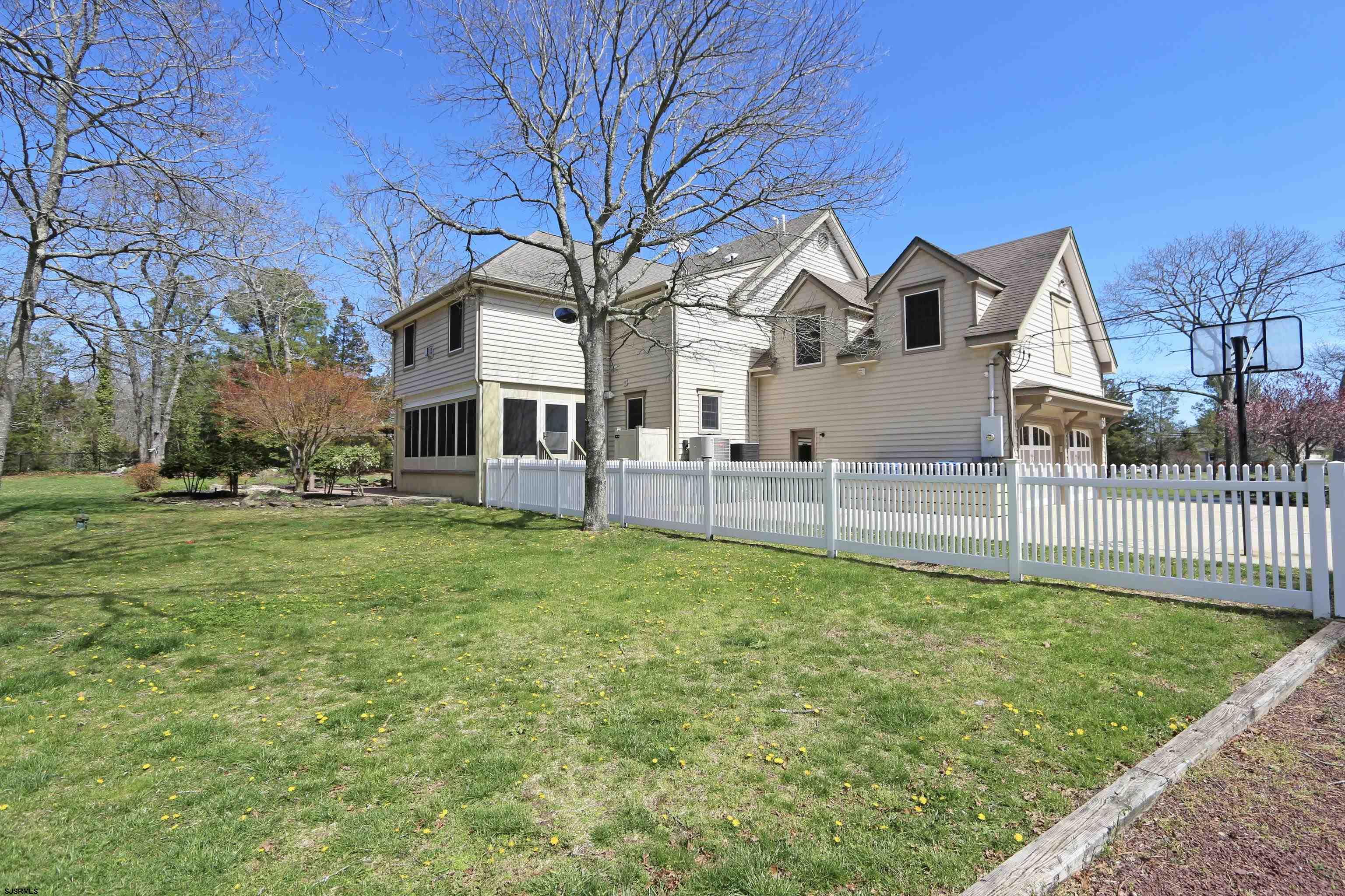 1322 Shore Road Palermo, NJ 08230 - Photo 52 of 56 a front view of a house with a yard