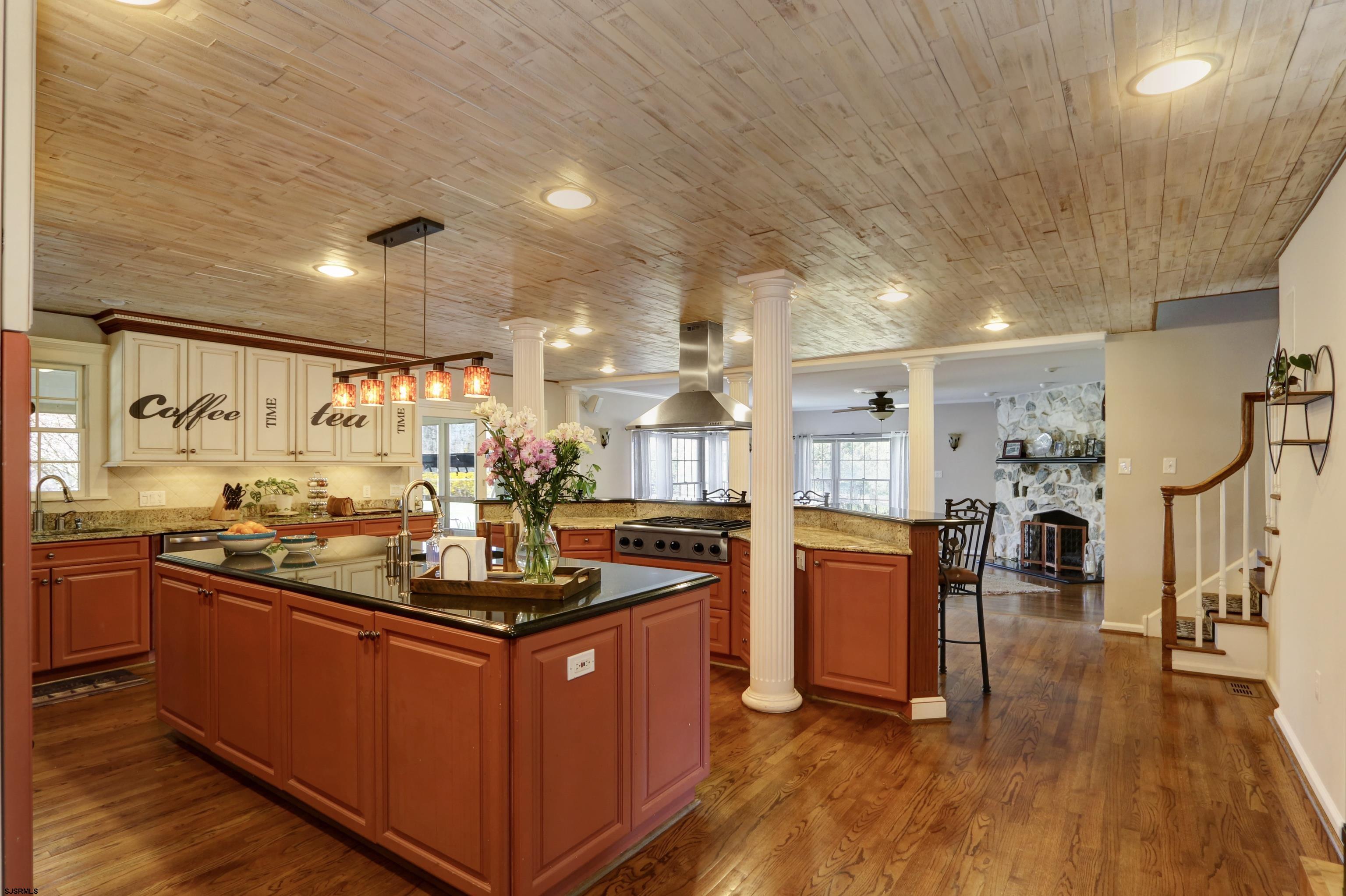 1322 Shore Road Palermo, NJ 08230 - Photo 6 of 56 a kitchen with stainless steel appliances granite countertop a stove and a sink