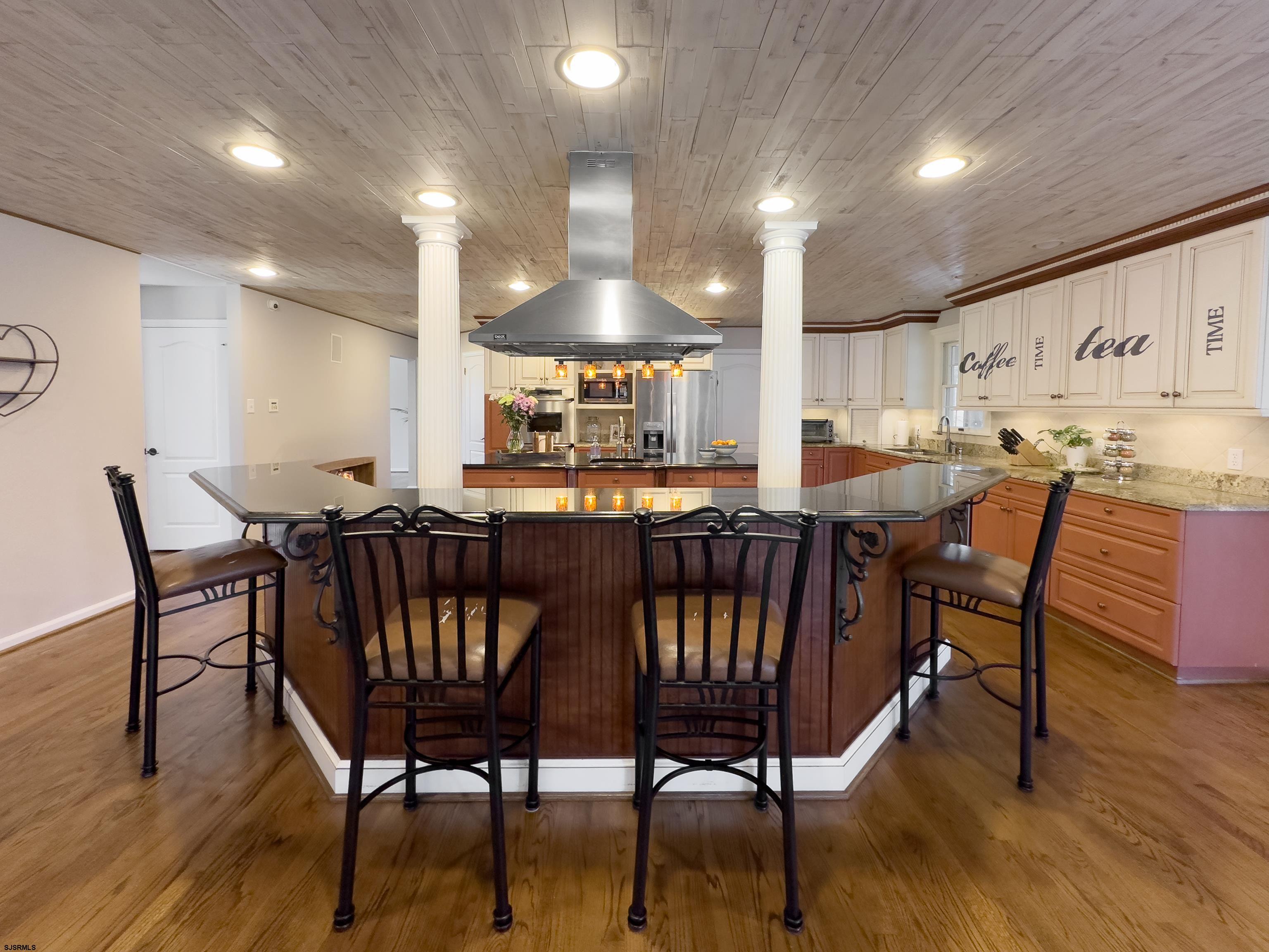 1322 Shore Road Palermo, NJ 08230 - Photo 9 of 56 a dining room with furniture and wooden floor