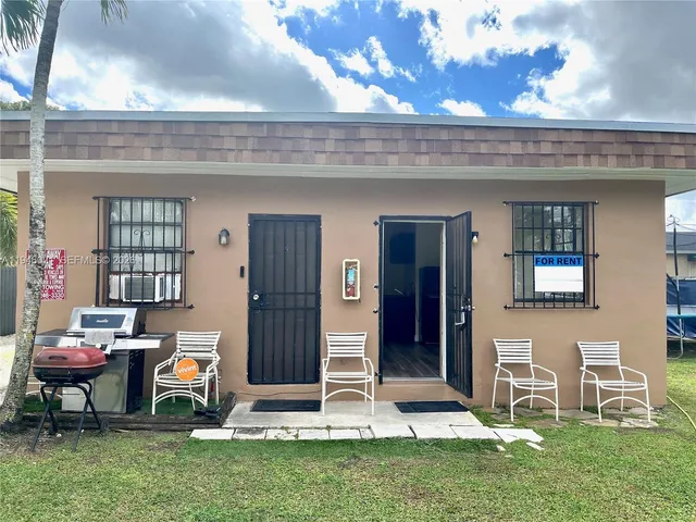 a living room with a furniture