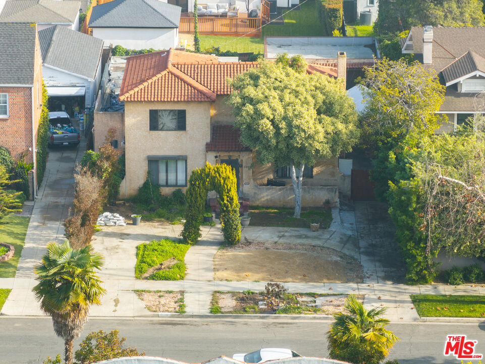 2208 Virginia Road Los Angeles, CA 90016 - Photo 8 of 8 a front view of a house with swimming pool