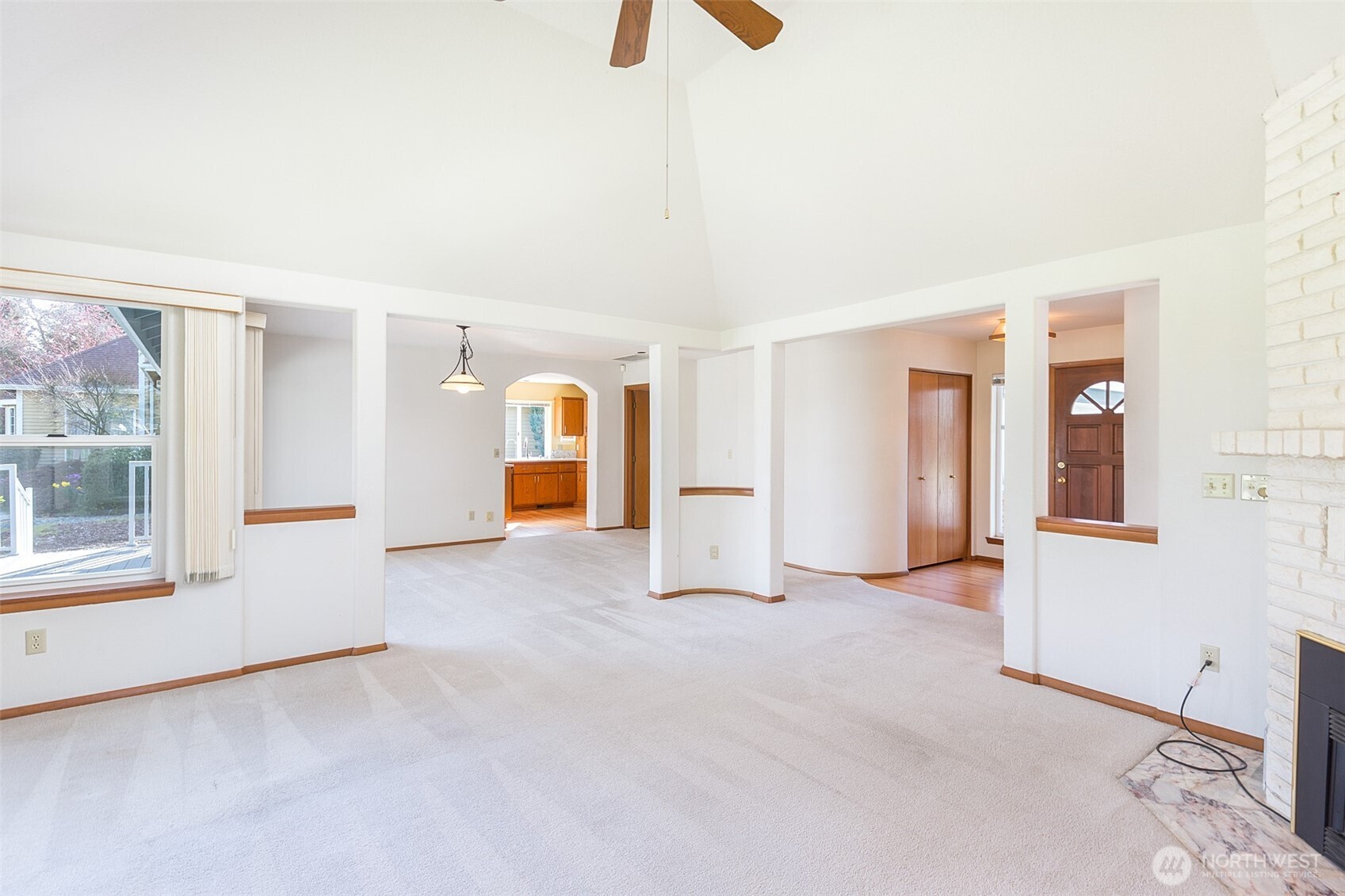 170 Hurricane Ridge Drive Sequim, WA 98382 - Photo 19 of 39 an empty room with windows and entrance