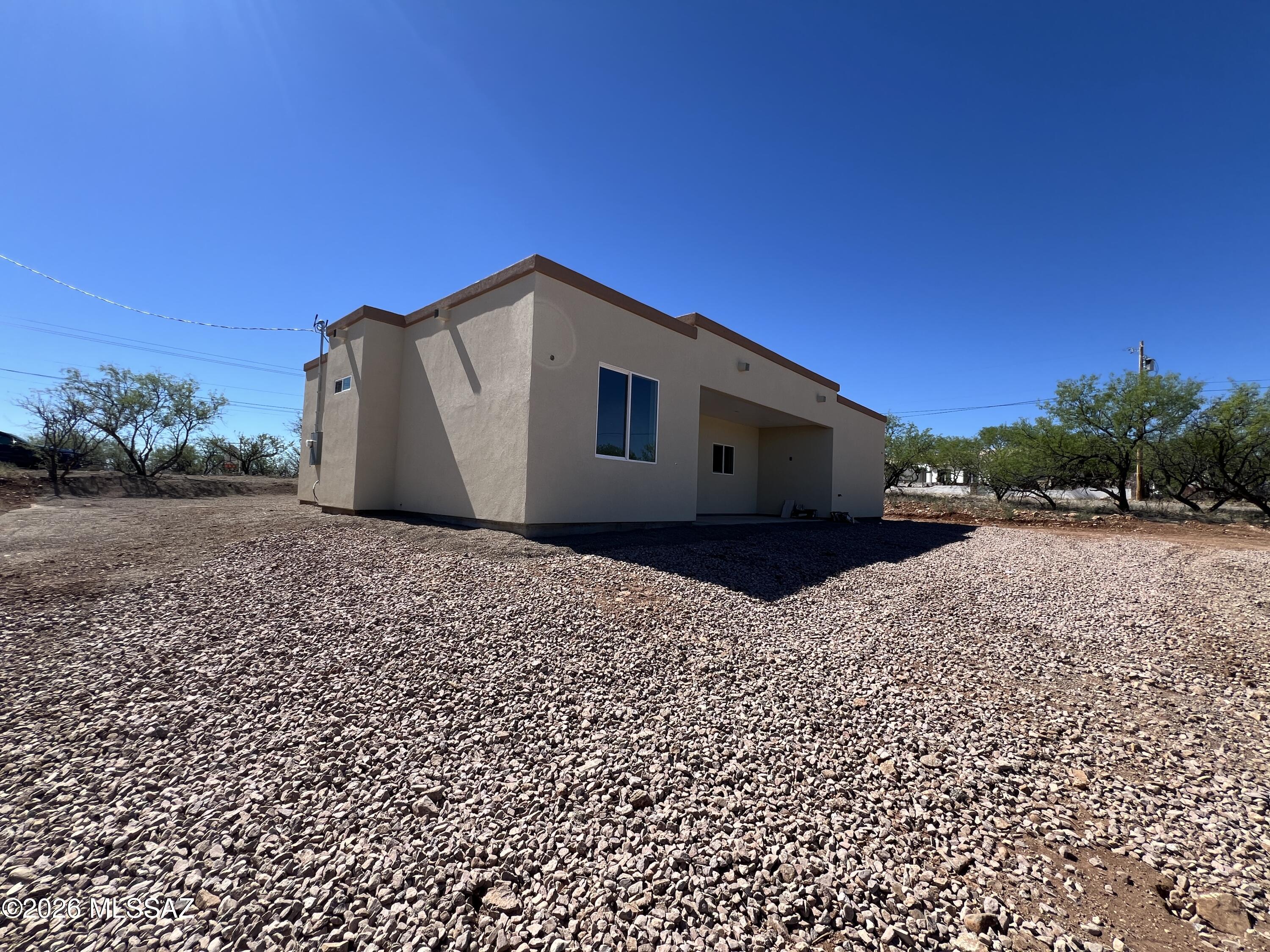 1501 Circulo Sombrero Rio Rico, AZ 85648 - Photo 24 of 26 a house with a yard