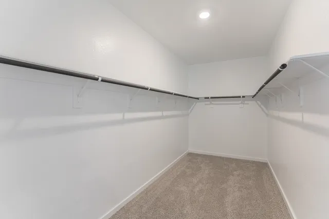 a bathroom with 2 sink and a mirror