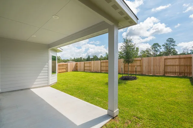 a house view with a garden space