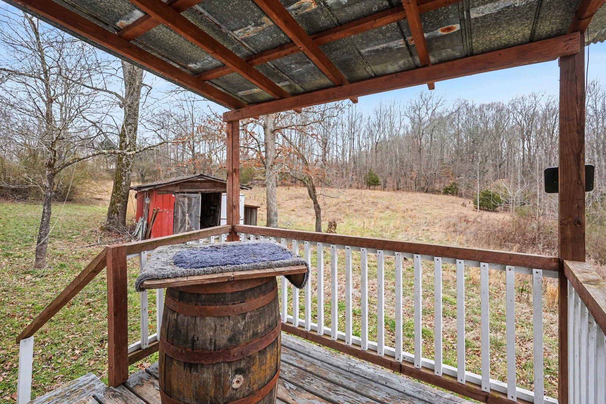 1323 Old Stage Road Charlotte, TN 37036 - Photo 11 of 25 a view of a balcony with furniture