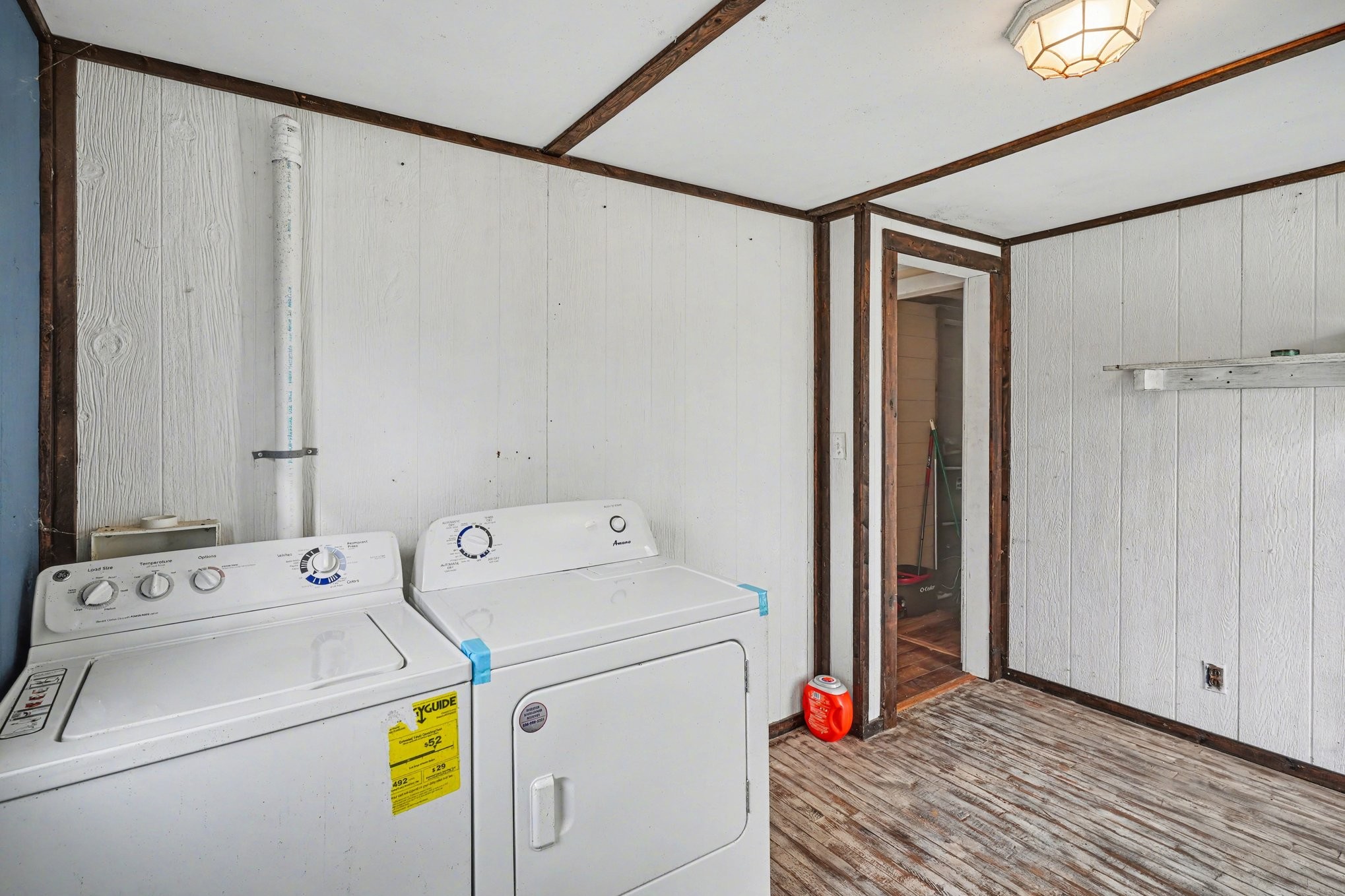 1323 Old Stage Road Charlotte, TN 37036 - Photo 14 of 25 a view of storage and utility room with washer and dryer