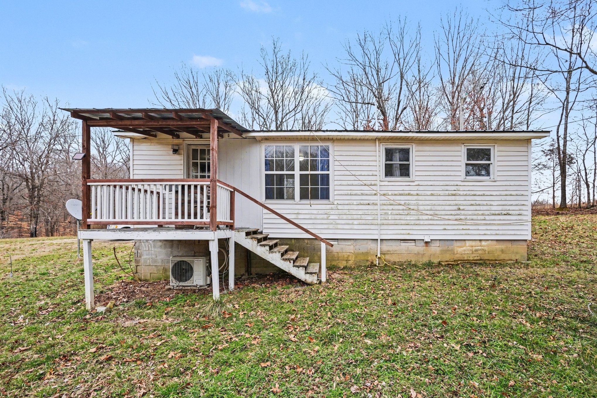 1323 Old Stage Road Charlotte, TN 37036 - Photo 20 of 25 a view of a house with a yard