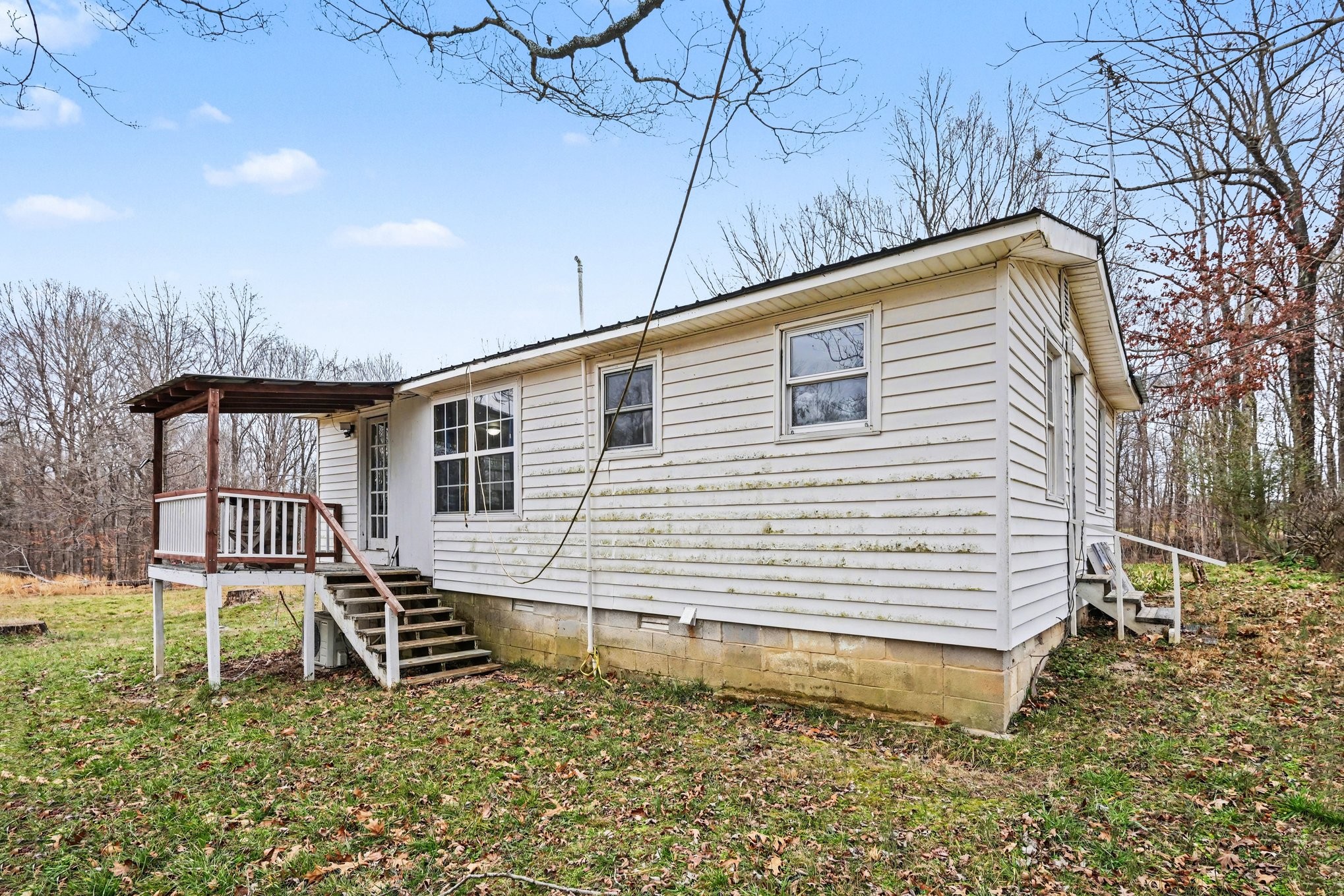 1323 Old Stage Road Charlotte, TN 37036 - Photo 22 of 25 a view of a house with a yard