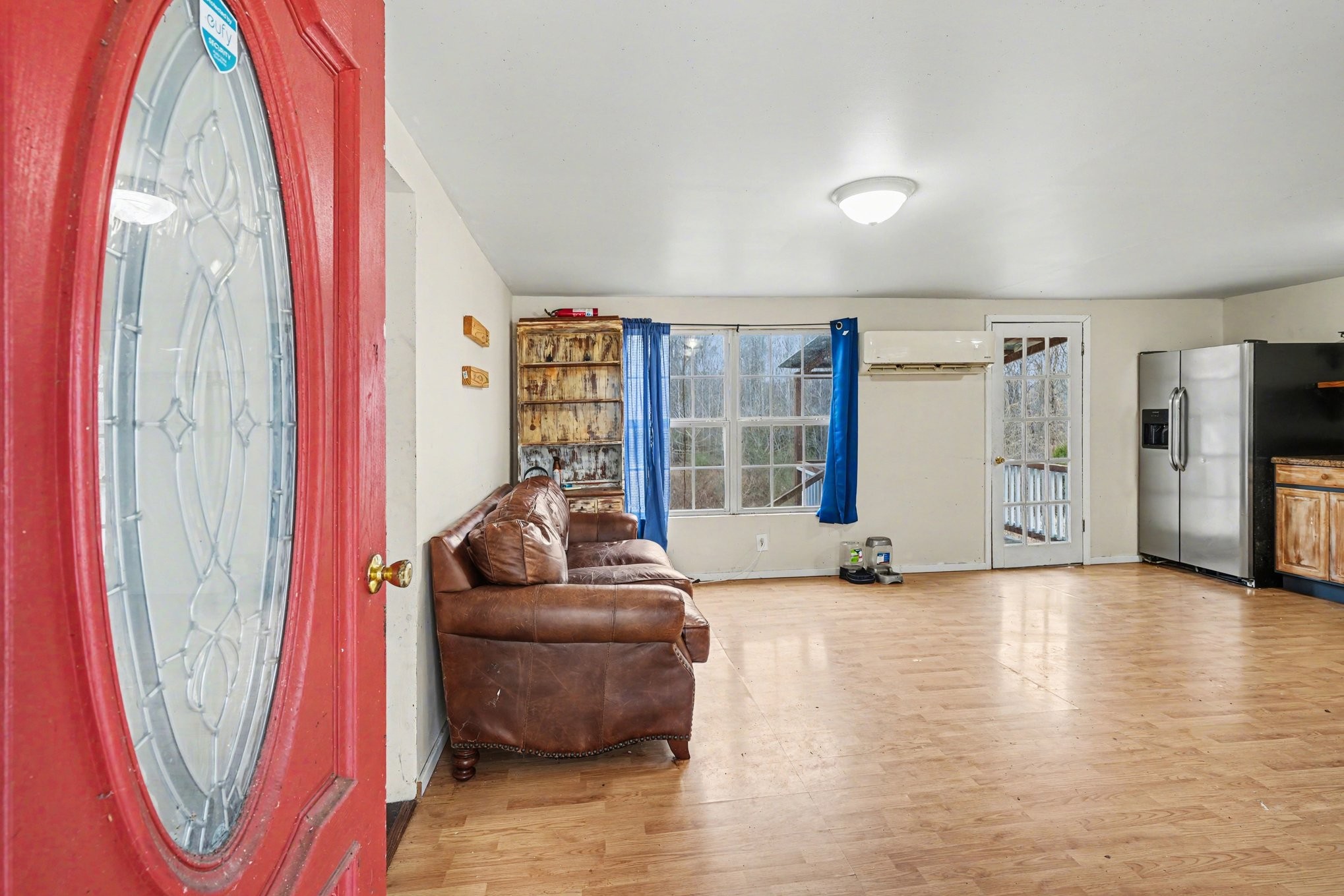 1323 Old Stage Road Charlotte, TN 37036 - Photo 3 of 25 a living room with furniture and a flat screen tv