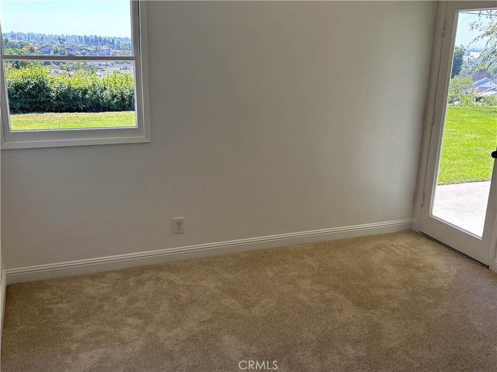 15828 West Road Whittier, CA 90603 - Photo 12 of 20 a view of an empty room and a window
