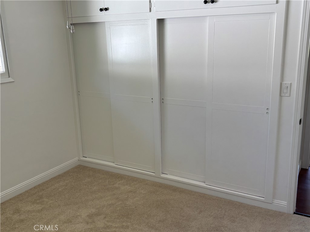 15828 West Road Whittier, CA 90603 - Photo 13 of 20 a room that has a window in it