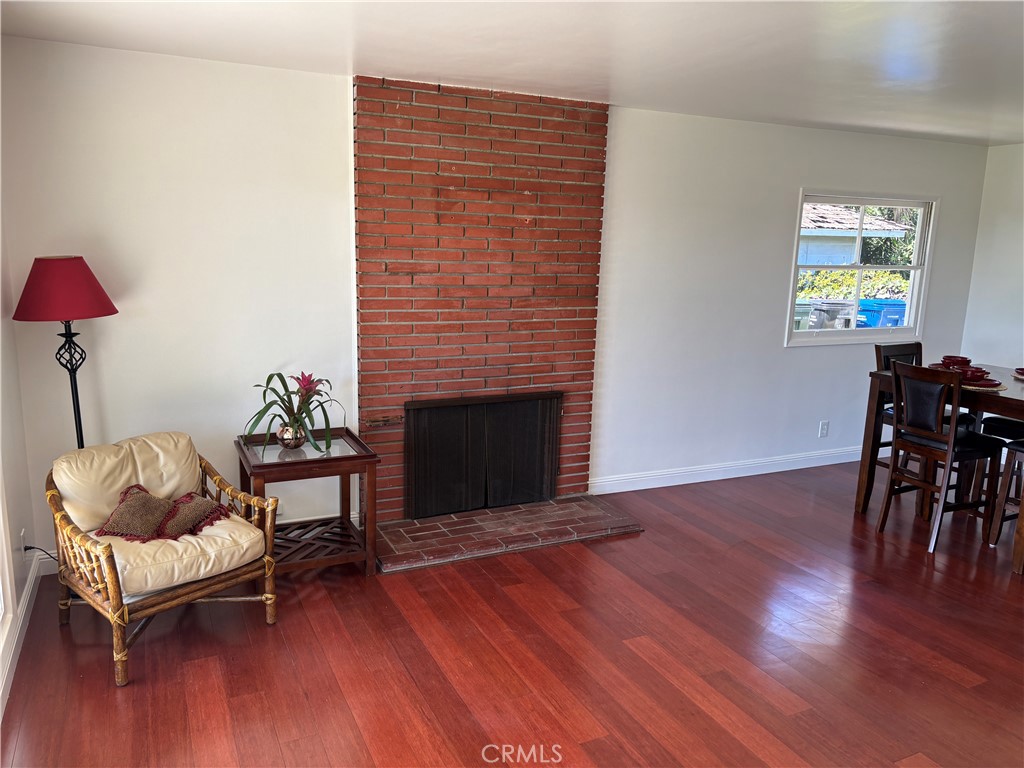 15828 West Road Whittier, CA 90603 - Photo 7 of 20 a living room with furniture and a fireplace