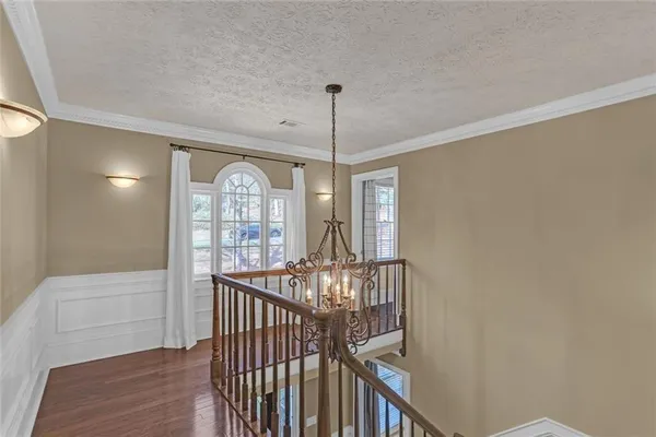a view of entryway with wooden floor