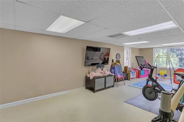 a view of a room with gym equipment