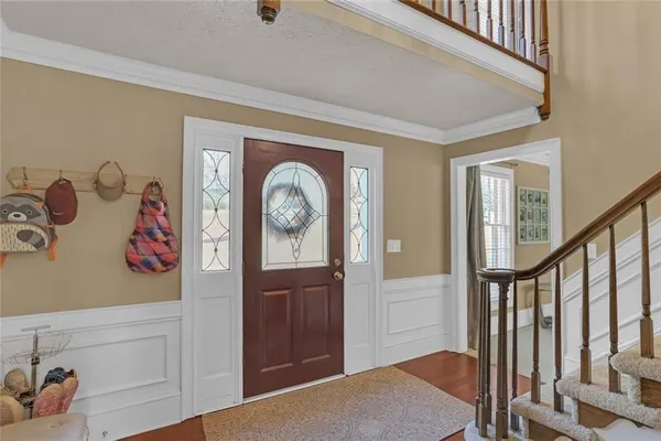 a view of front door and bedroom