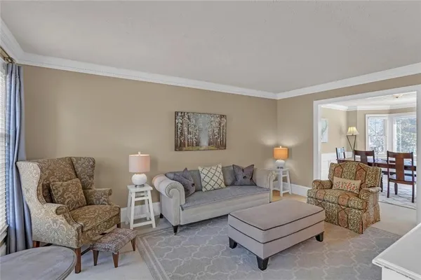 a living room with furniture and a couch
