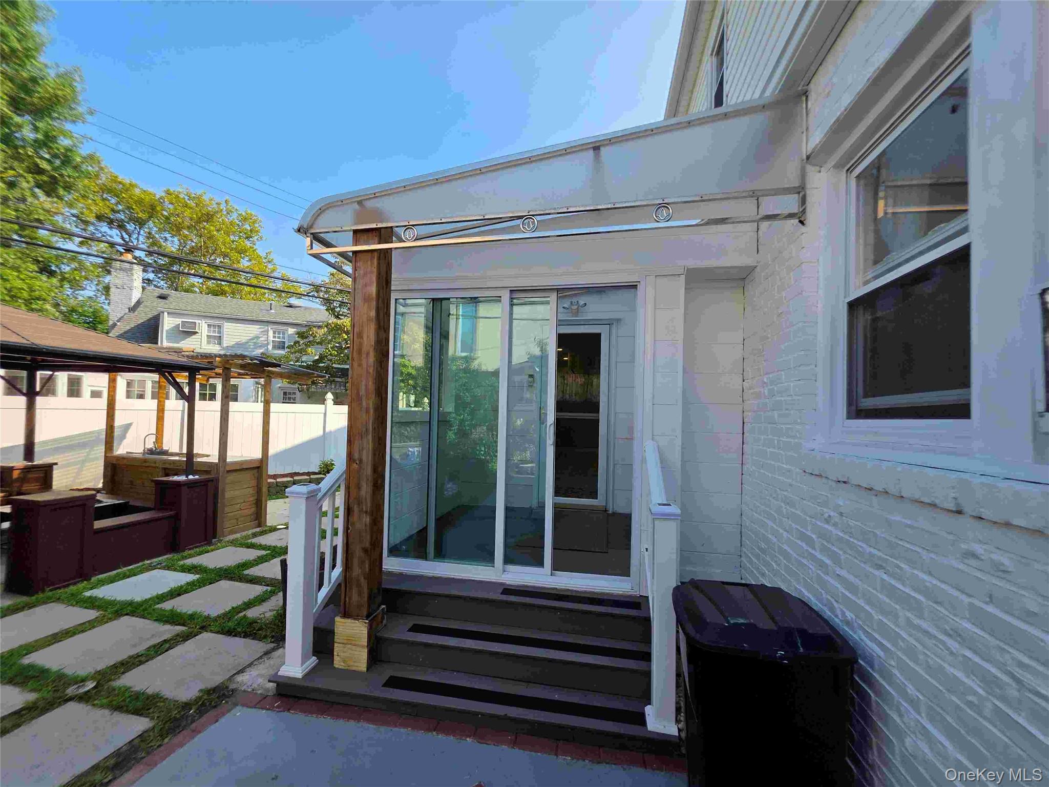 30 Aberdeen Road New Hyde Park, NY 11040 - Photo 17 of 37 a view of a balcony with chairs