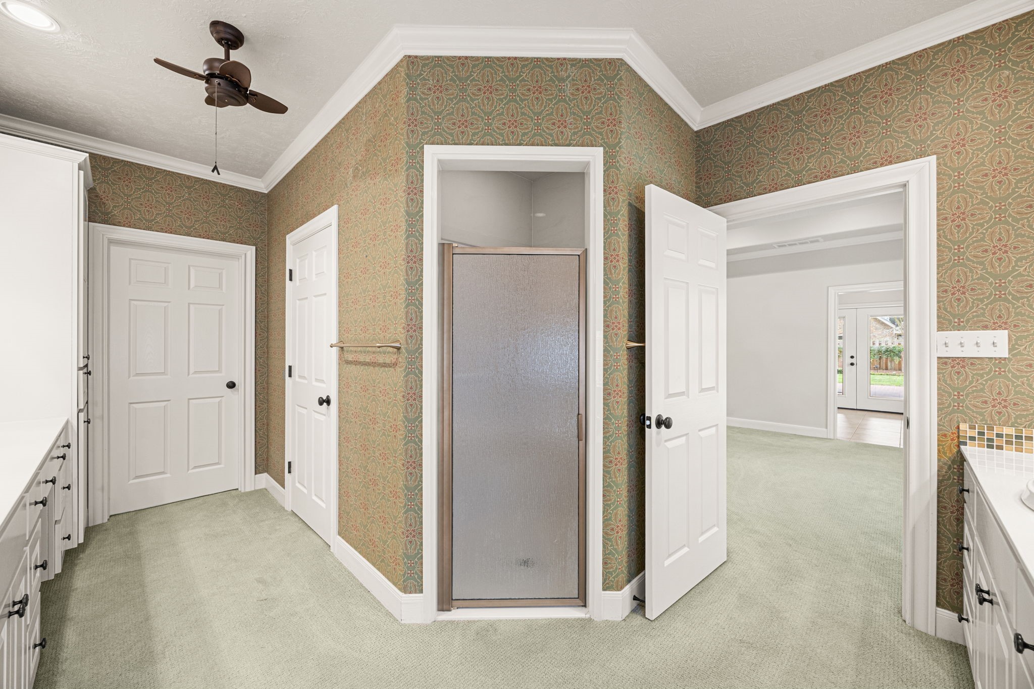 1220 Travis Street Columbus, TX 78934 - Photo 24 of 39 a view of a big room with closet and wooden floor