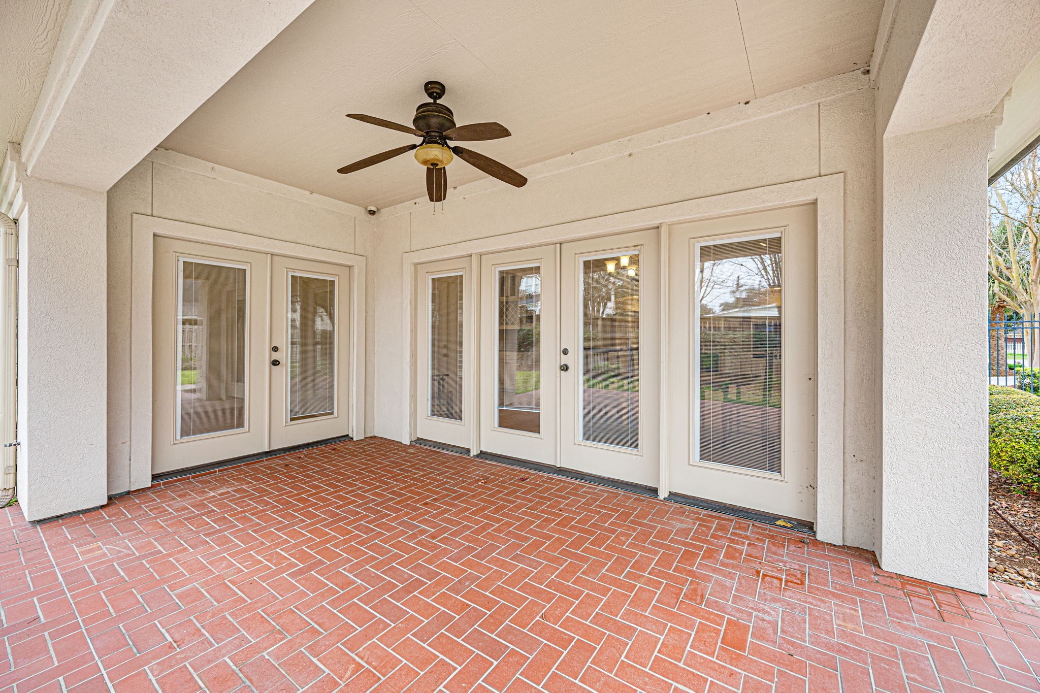 1220 Travis Street Columbus, TX 78934 - Photo 33 of 39 a view of empty room with wooden floor and fan