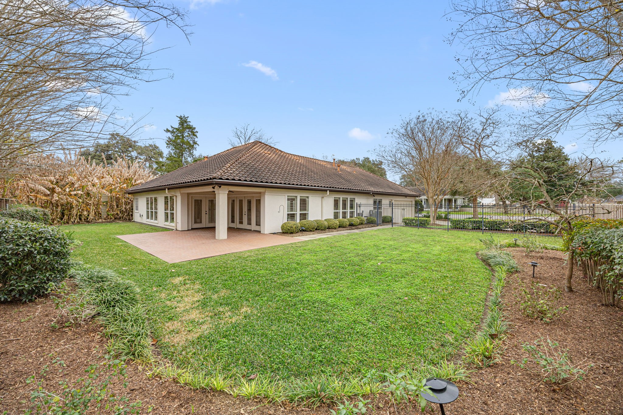 1220 Travis Street Columbus, TX 78934 - Photo 36 of 39 a front view of a house with yard and green space