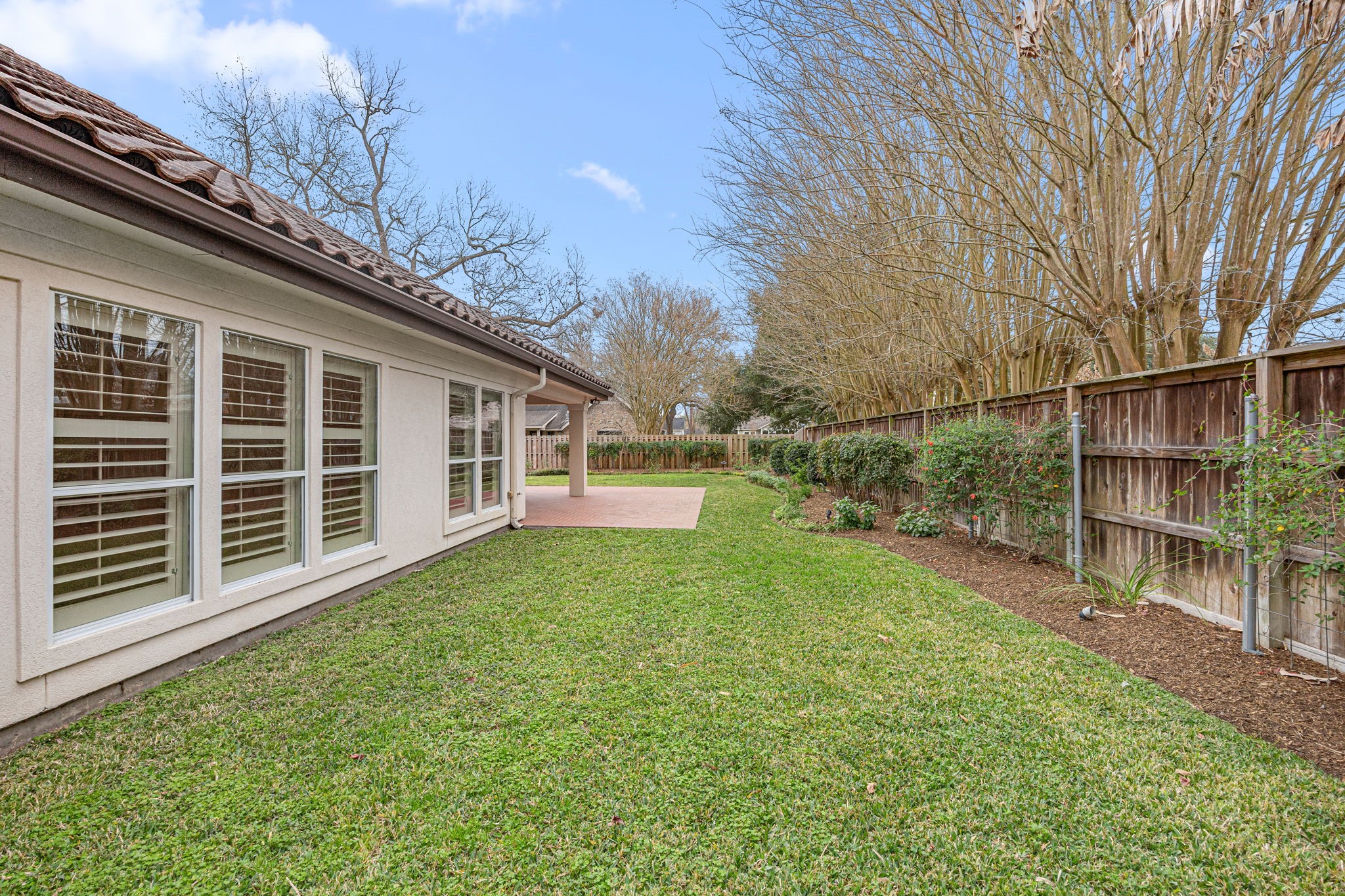 1220 Travis Street Columbus, TX 78934 - Photo 37 of 39 a view of a house with backyard