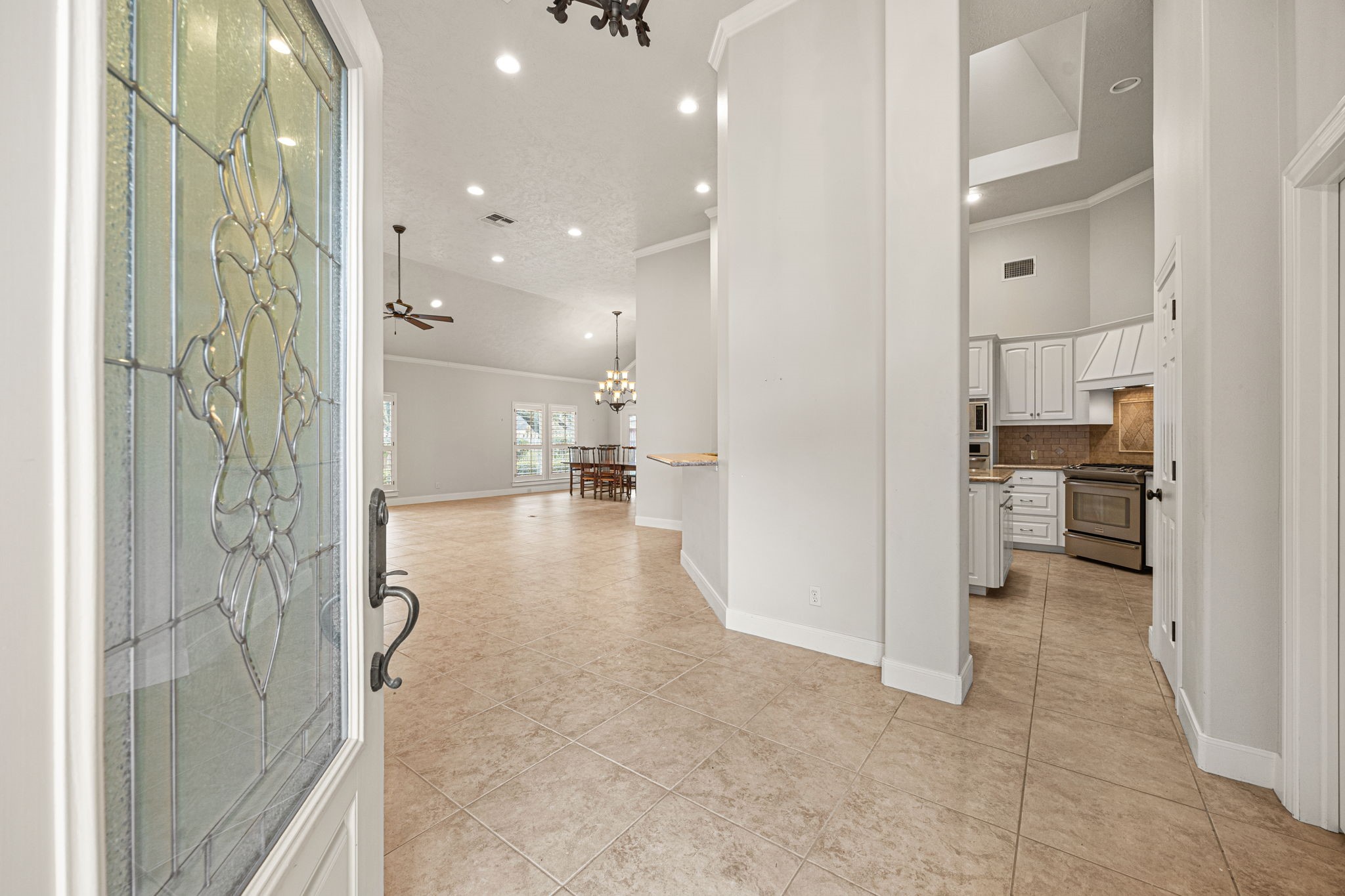 1220 Travis Street Columbus, TX 78934 - Photo 6 of 39 a view of a bathroom with a glass shower door