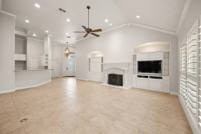 a view of dining room with furniture and chandelier