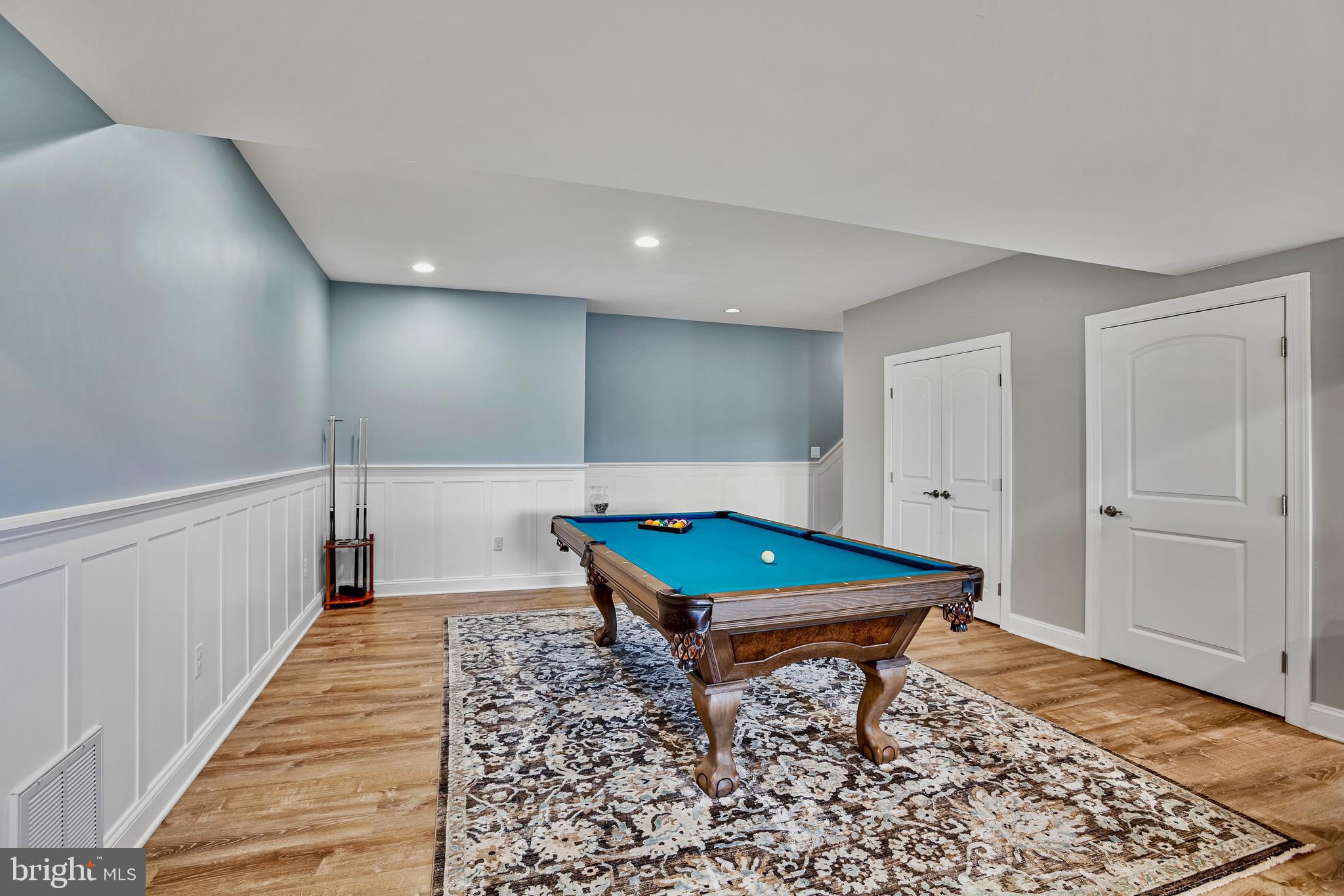 18604 Wild Raspberry Drive Purcellville, VA 20132 - Photo 32 of 58 a room with pool table and wooden floor
