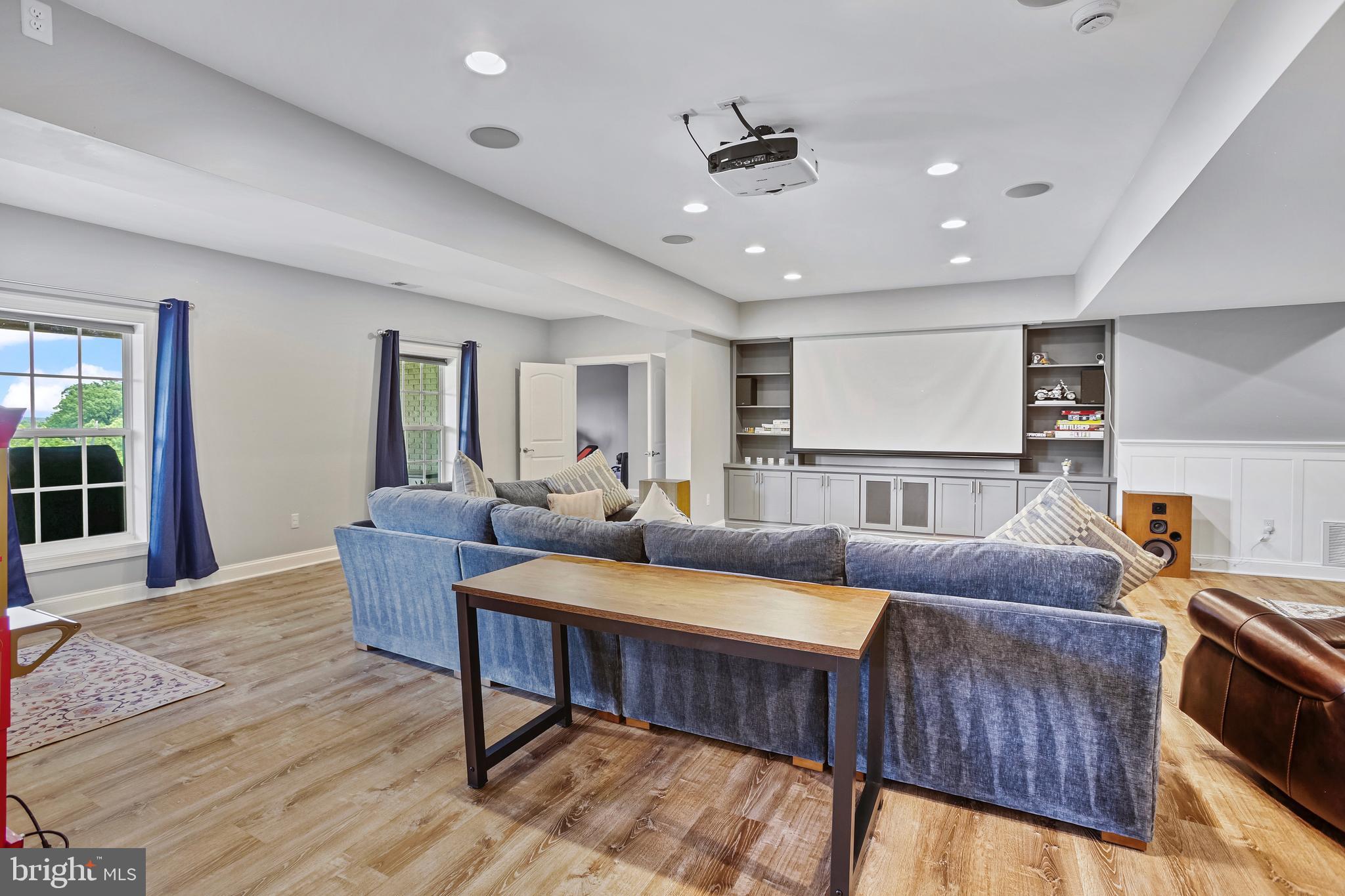 18604 Wild Raspberry Drive Purcellville, VA 20132 - Photo 33 of 58 a living room with furniture and a wooden floor