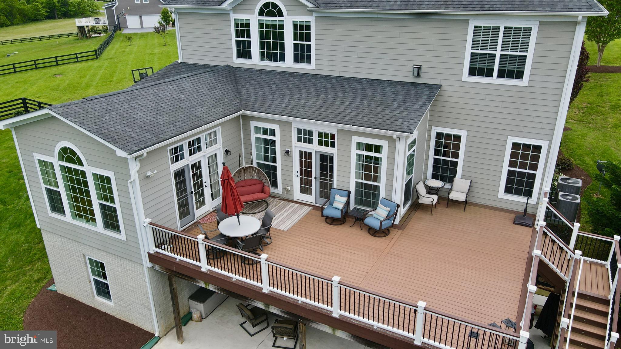 18604 Wild Raspberry Drive Purcellville, VA 20132 - Photo 41 of 58 a view of a house with a wooden deck