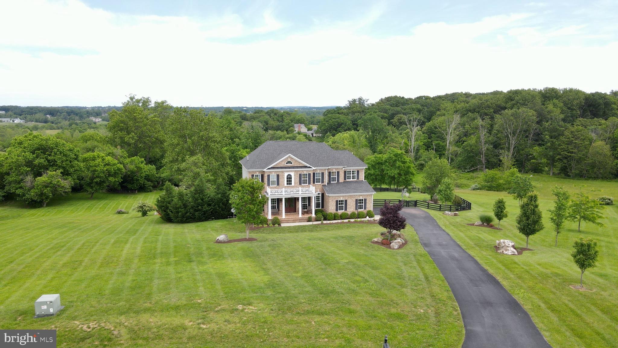 18604 Wild Raspberry Drive Purcellville, VA 20132 - Photo 44 of 58 a view of a house with a big yard