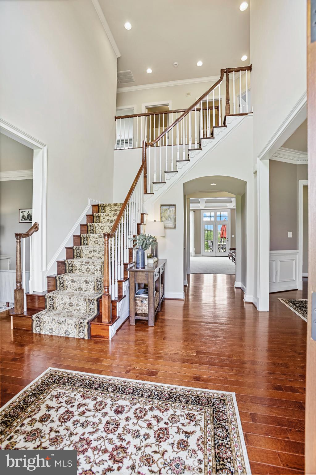 18604 Wild Raspberry Drive Purcellville, VA 20132 - Photo 5 of 58 a view of entryway and hall with wooden floor