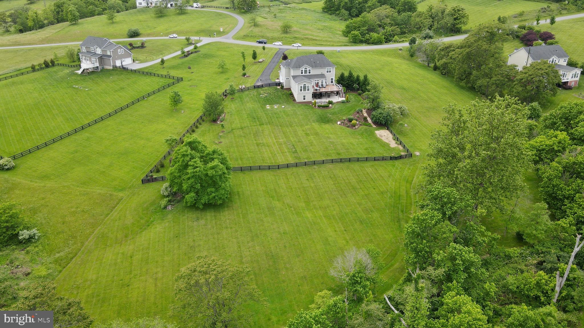 18604 Wild Raspberry Drive Purcellville, VA 20132 - Photo 51 of 58 a view of a houses with a yard