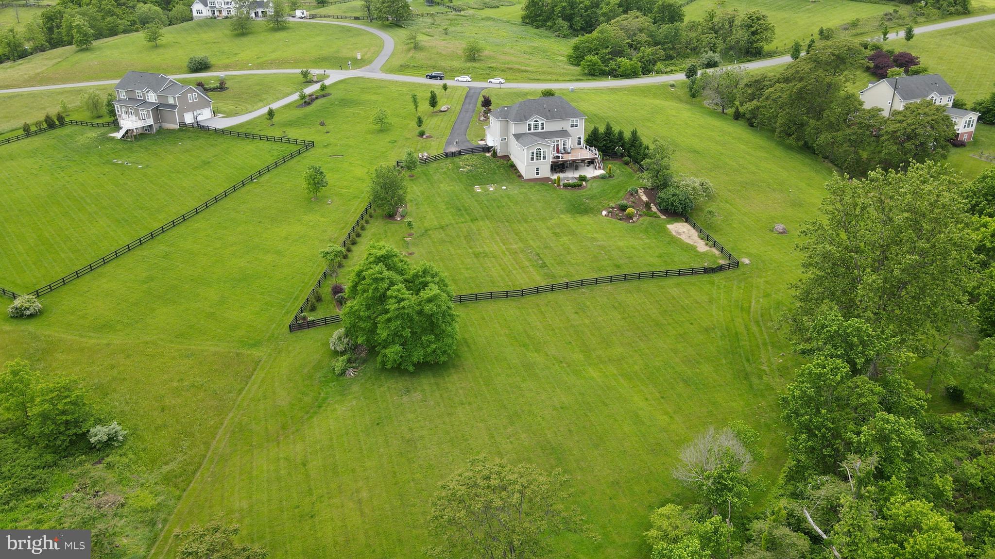 18604 Wild Raspberry Drive Purcellville, VA 20132 - Photo 52 of 58 a aerial view of a house with a yard