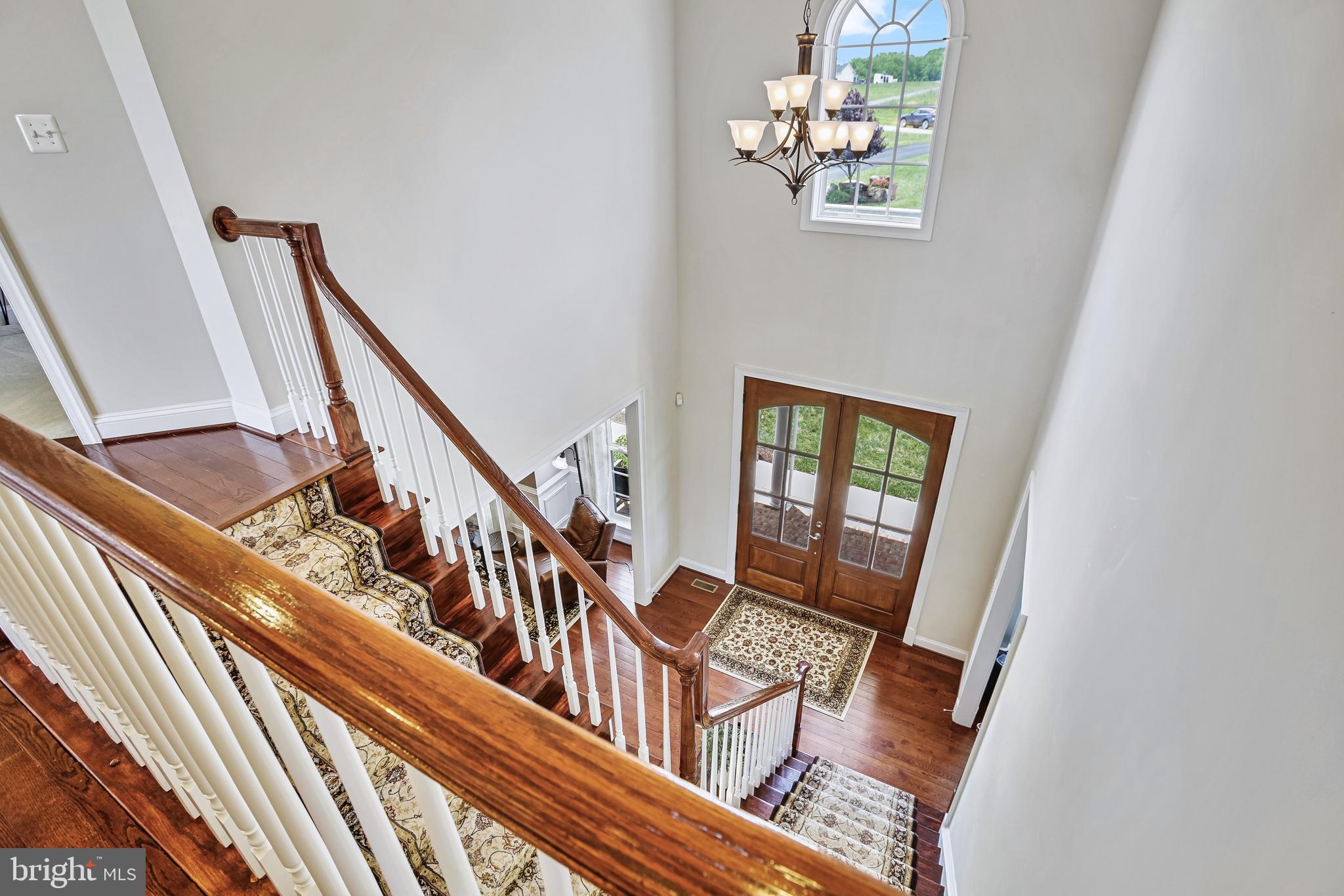 18604 Wild Raspberry Drive Purcellville, VA 20132 - Photo 6 of 58 a view of an entryway with wooden floor