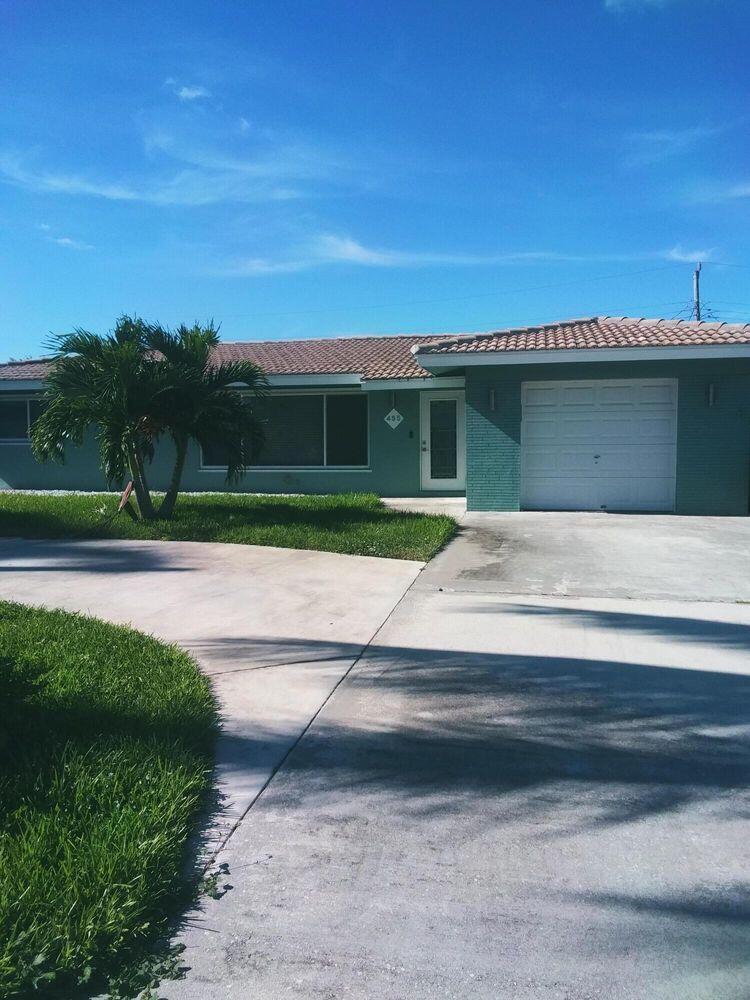 455 Northeast 29th Street Boca Raton, FL 33431 - Photo 8 of 47 front of home.