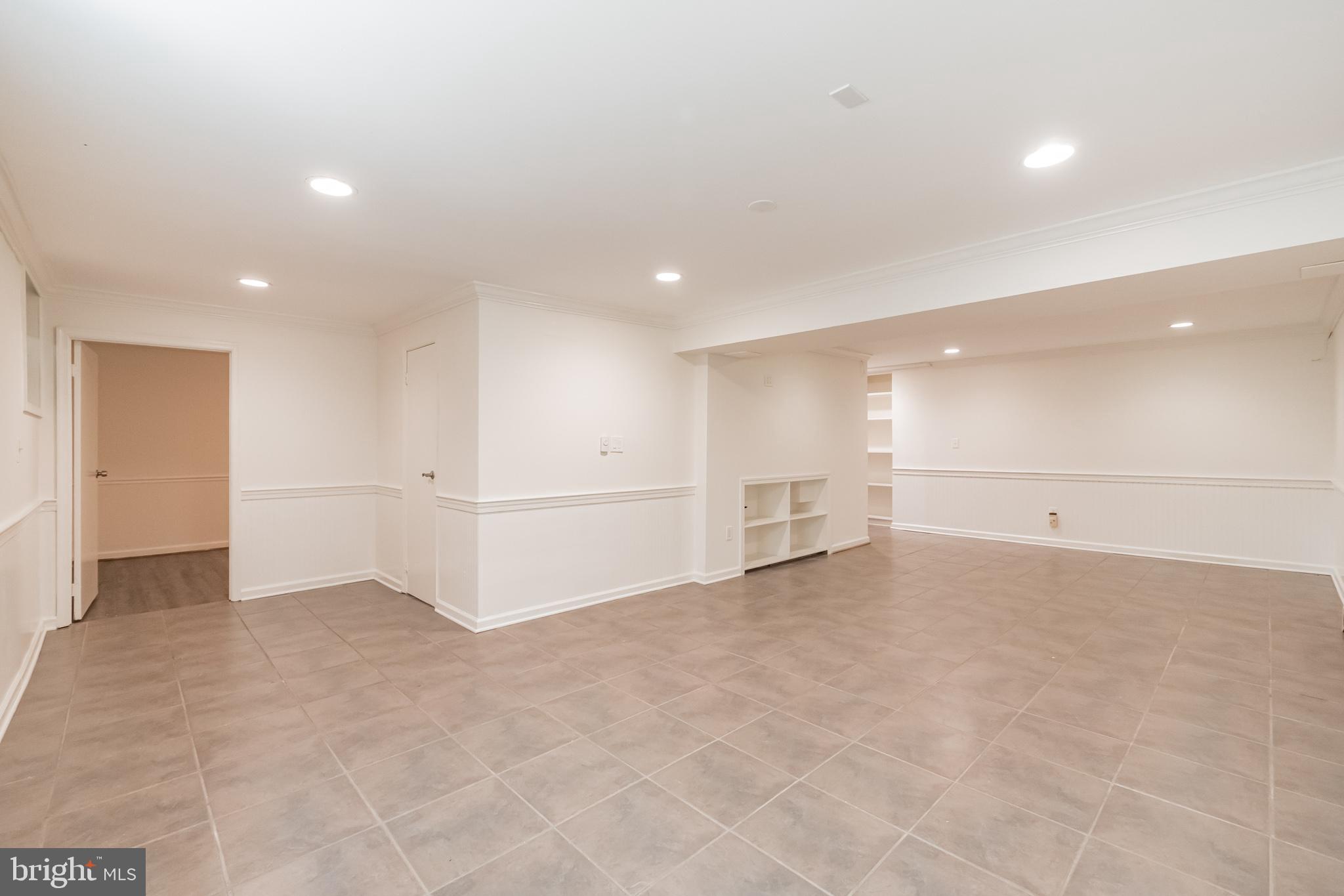12517 Deoudes Road Boyds, MD 20841 - Photo 26 of 33 Lower level recreation room with heated floors
