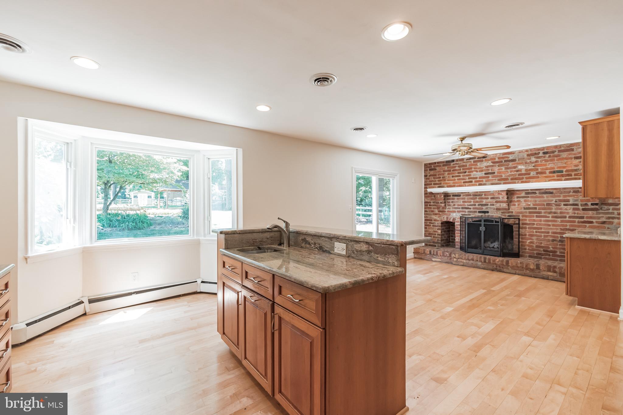 12517 Deoudes Road Boyds, MD 20841 - Photo 7 of 33 Kitchen is open to the family room & fireplace
